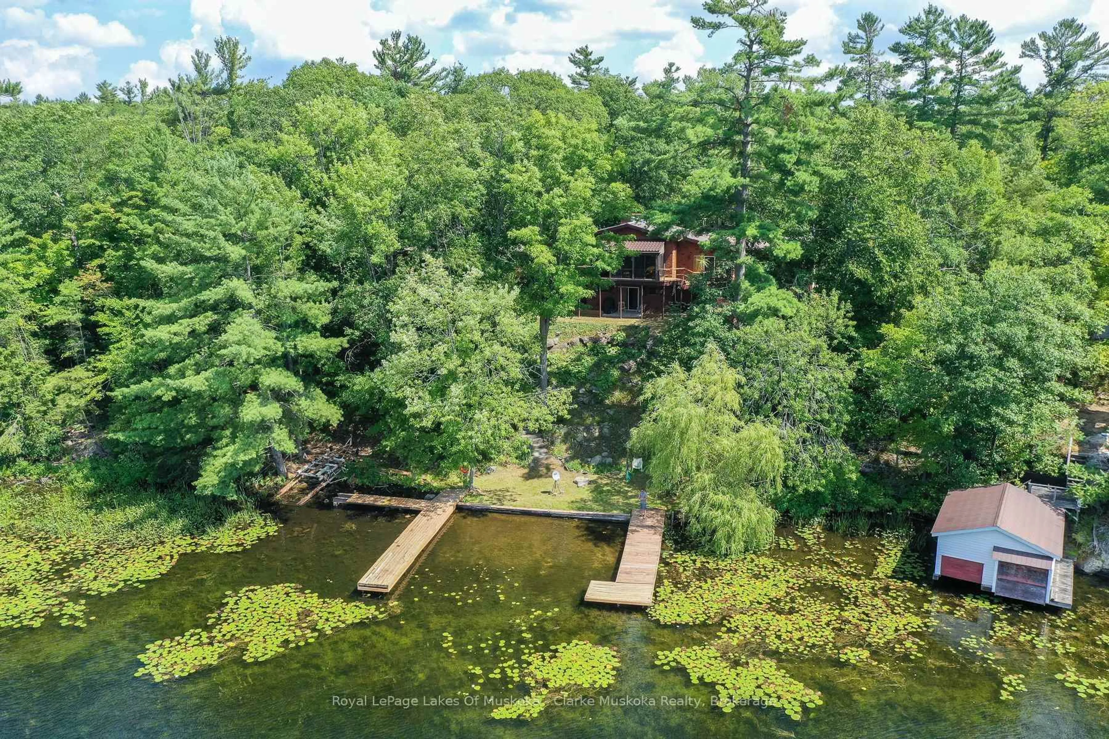 A pic from outside/outdoor area/front of a property/back of a property/a pic from drone, water/lake/river/ocean view for 108 Six Mile Channel Rd, Georgian Bay Ontario L0K 1E0