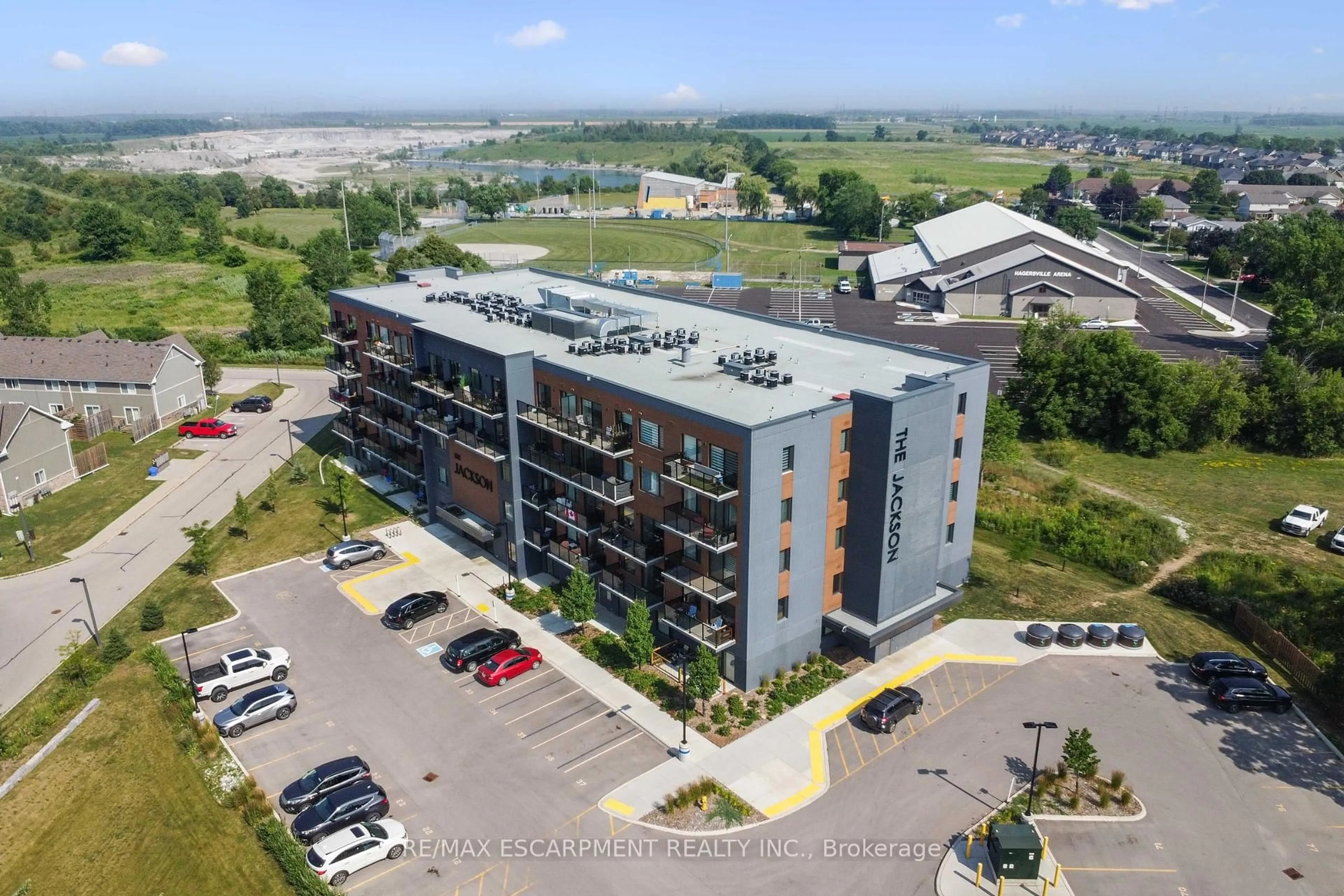 A pic from outside/outdoor area/front of a property/back of a property/a pic from drone, building for 64 MAIN St #303, Haldimand Ontario N0A 1H0