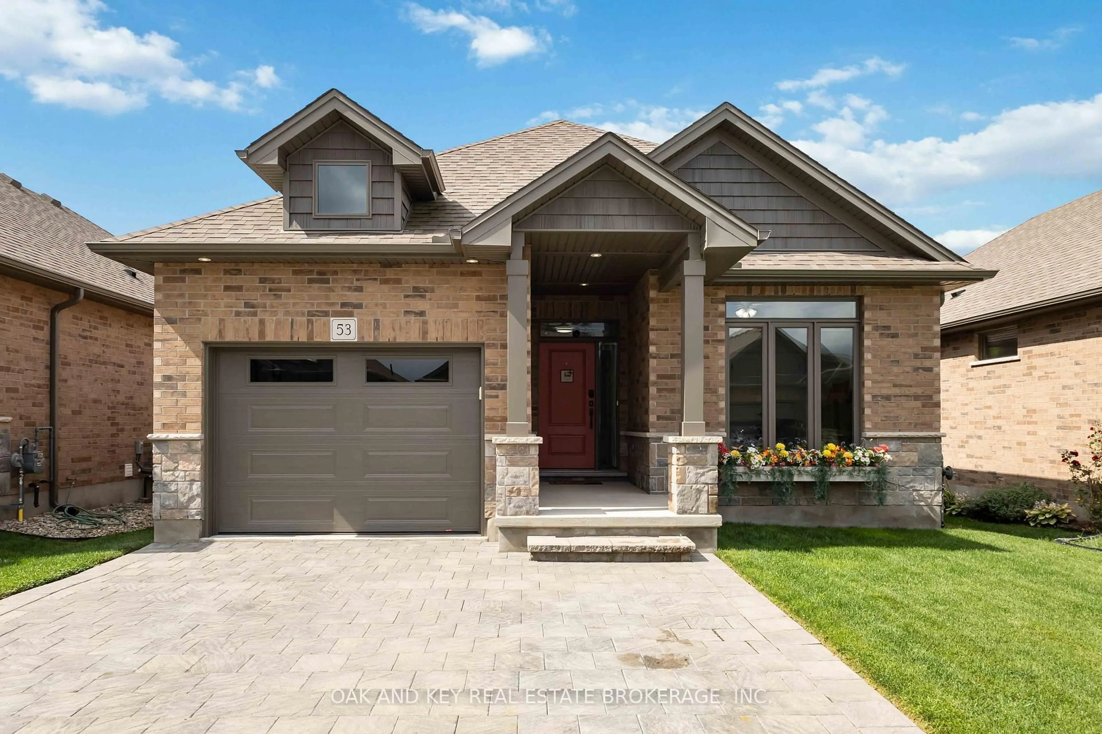 Home with brick exterior material, street for 159 Collins Way #53, Strathroy-Caradoc Ontario N7G 0G8