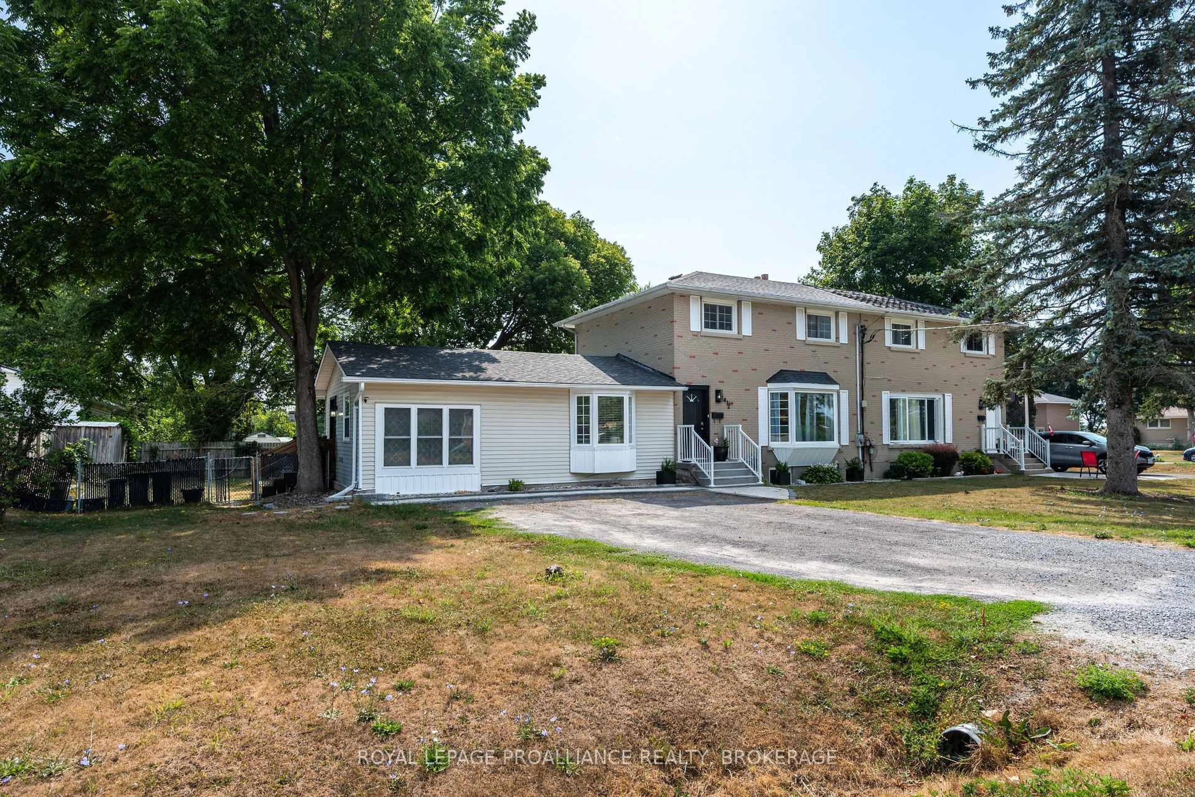 Home with vinyl exterior material, street for 1412 Mildred St, Kingston Ontario K7L 4V4