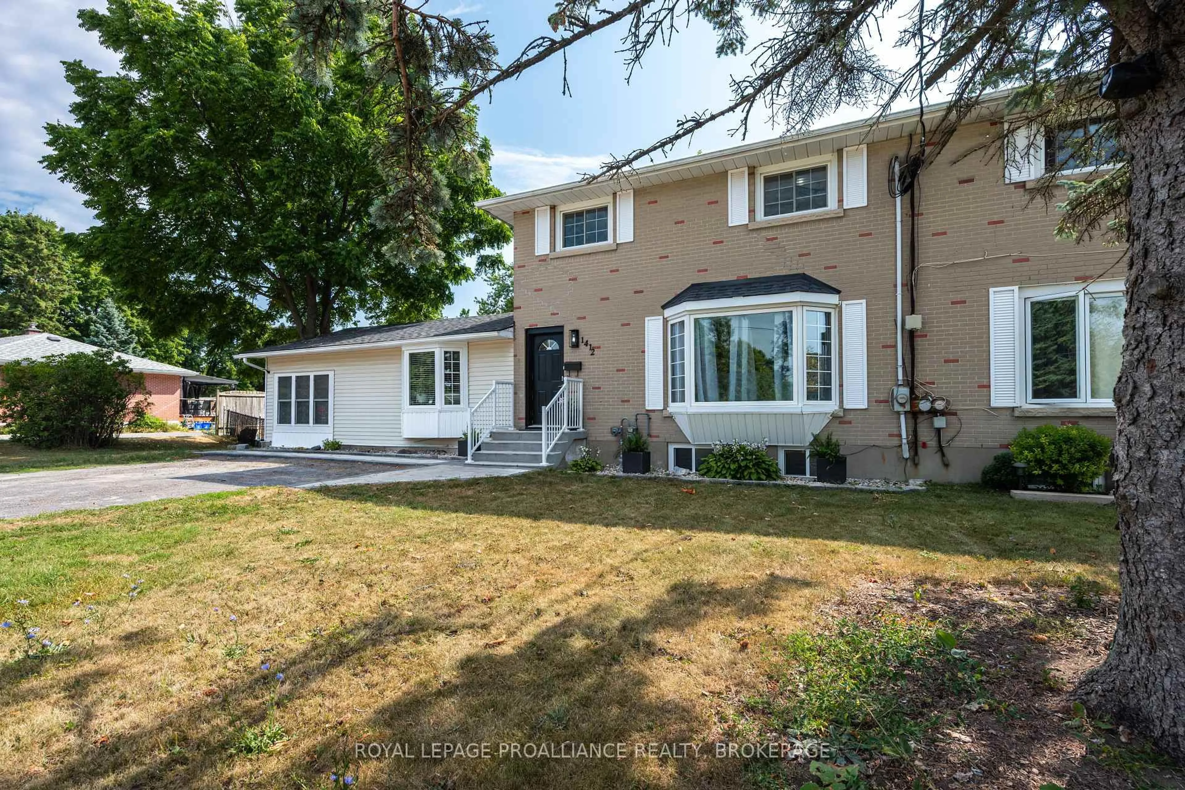 Home with vinyl exterior material, street for 1412 Mildred St, Kingston Ontario K7L 4V4