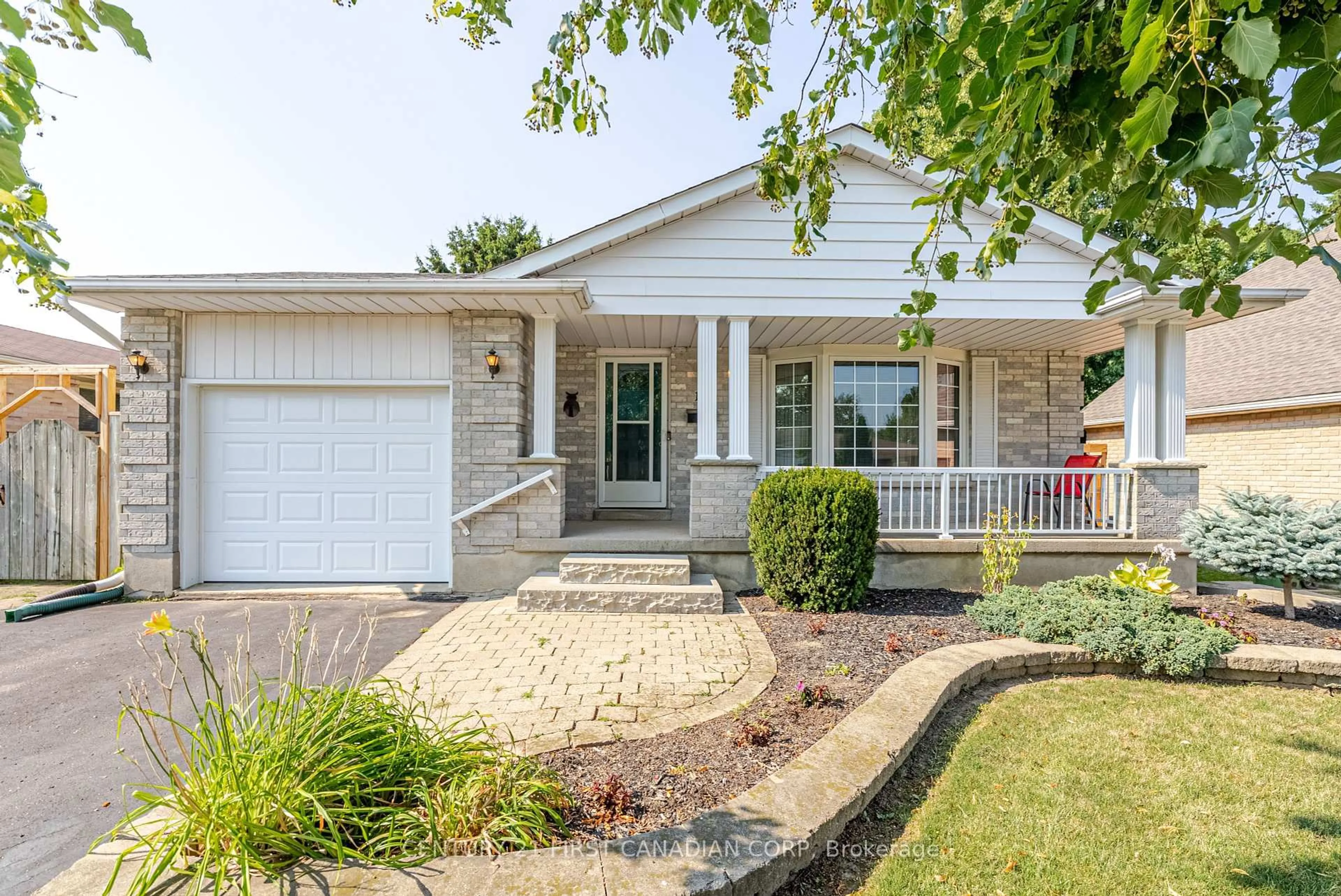 Home with vinyl exterior material, street for 19 Farmington Dr, St. Thomas Ontario N5R 5X2