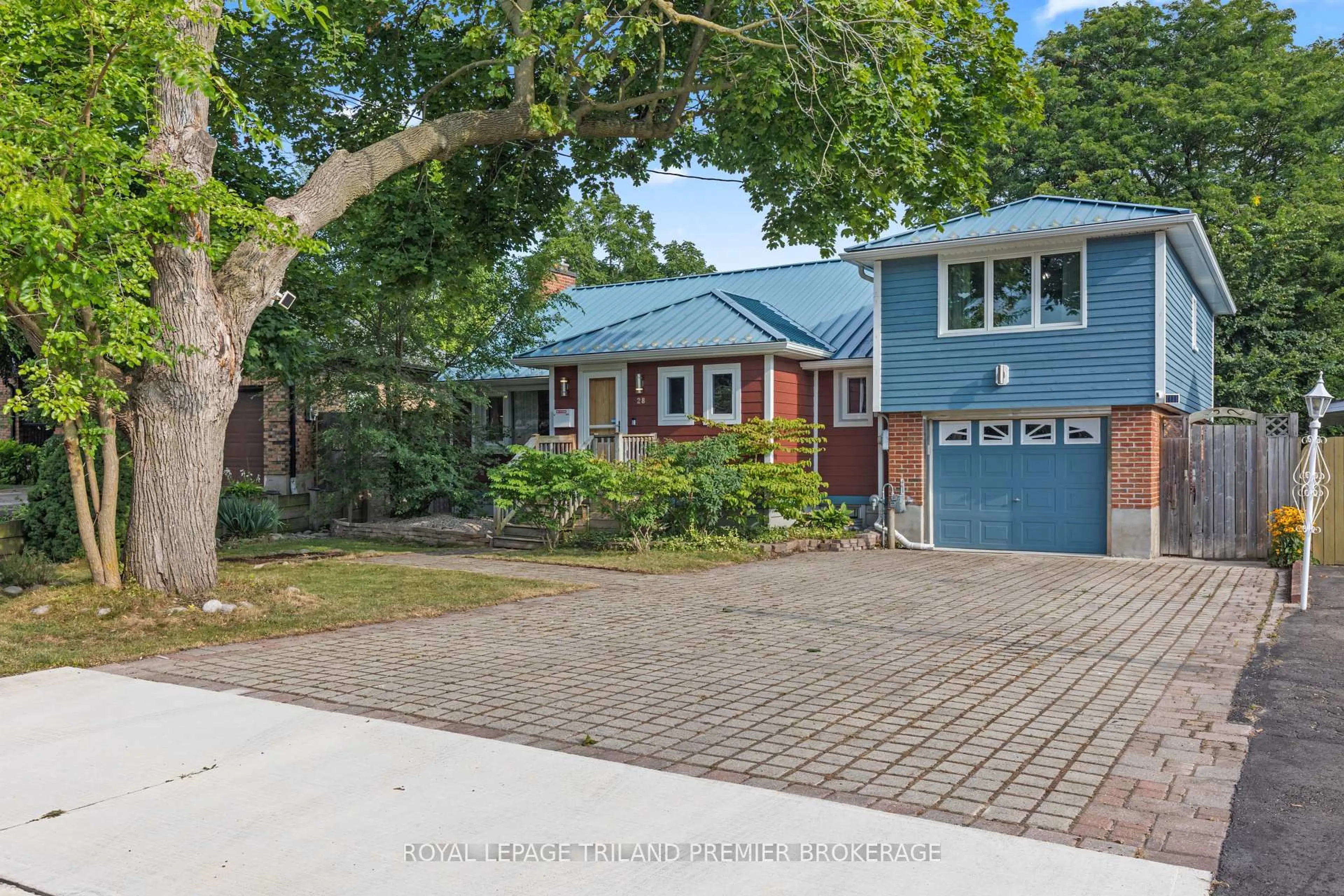Home with brick exterior material, street for 28 Elworthy Ave, London South Ontario N6C 2M2