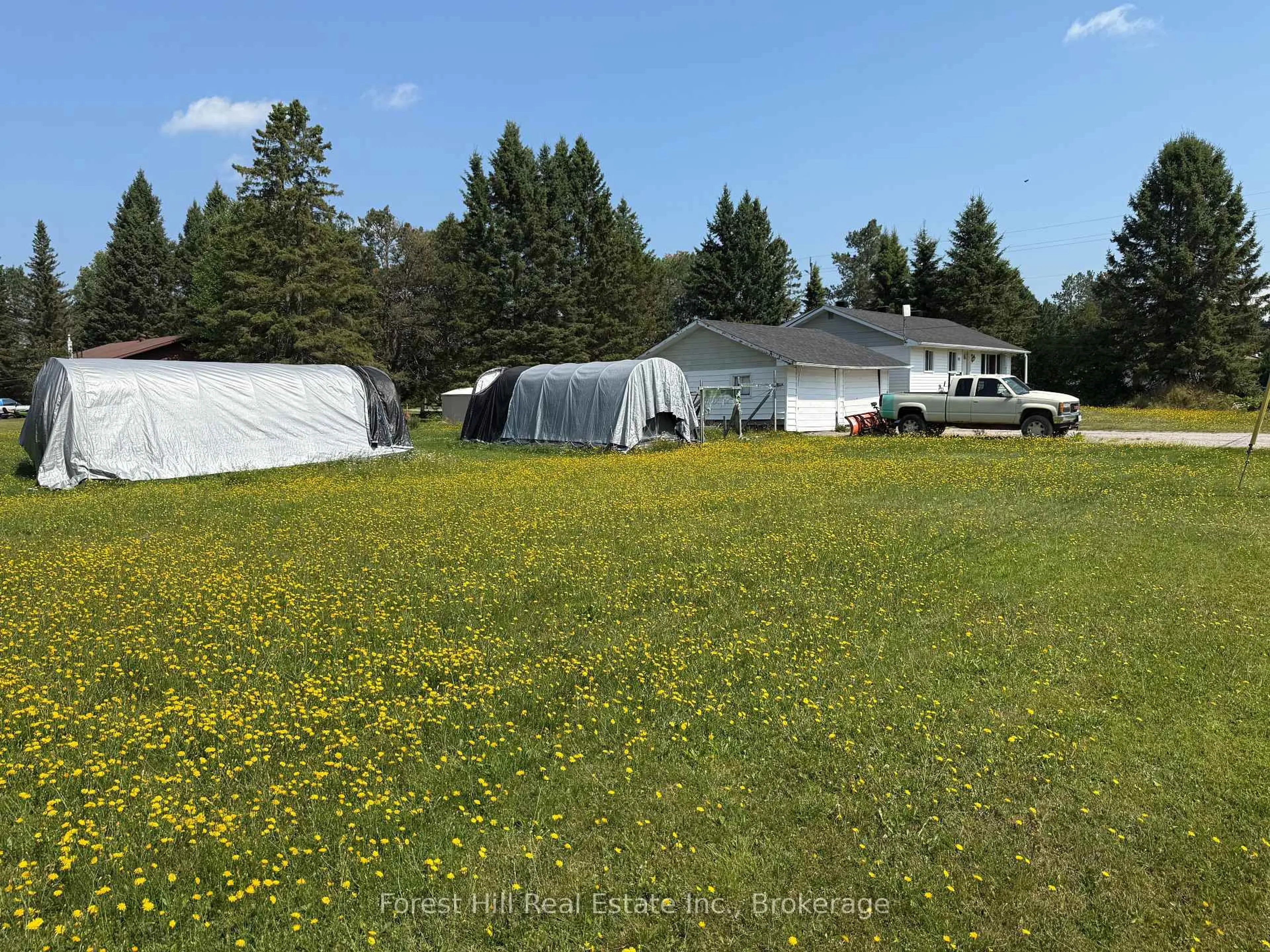 A pic from outside/outdoor area/front of a property/back of a property/a pic from drone, unknown for 502 Sweezy St, Powassan Ontario P0H 2L0