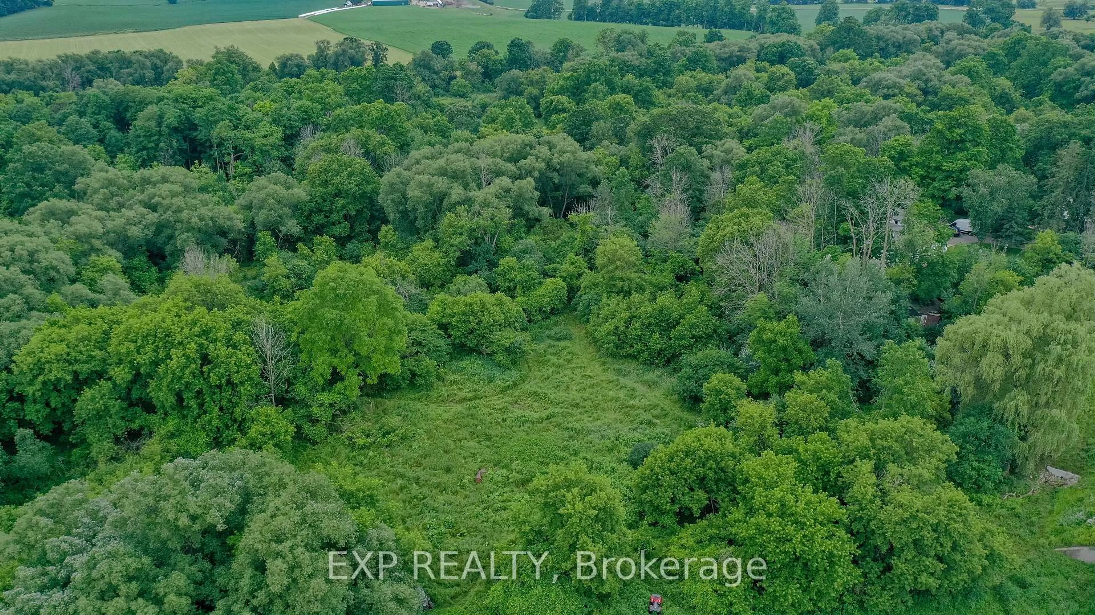 A pic from outside/outdoor area/front of a property/back of a property/a pic from drone, forest/trees view for 1751 Sawmill Rd, Woolwich Ontario N2J 4G8