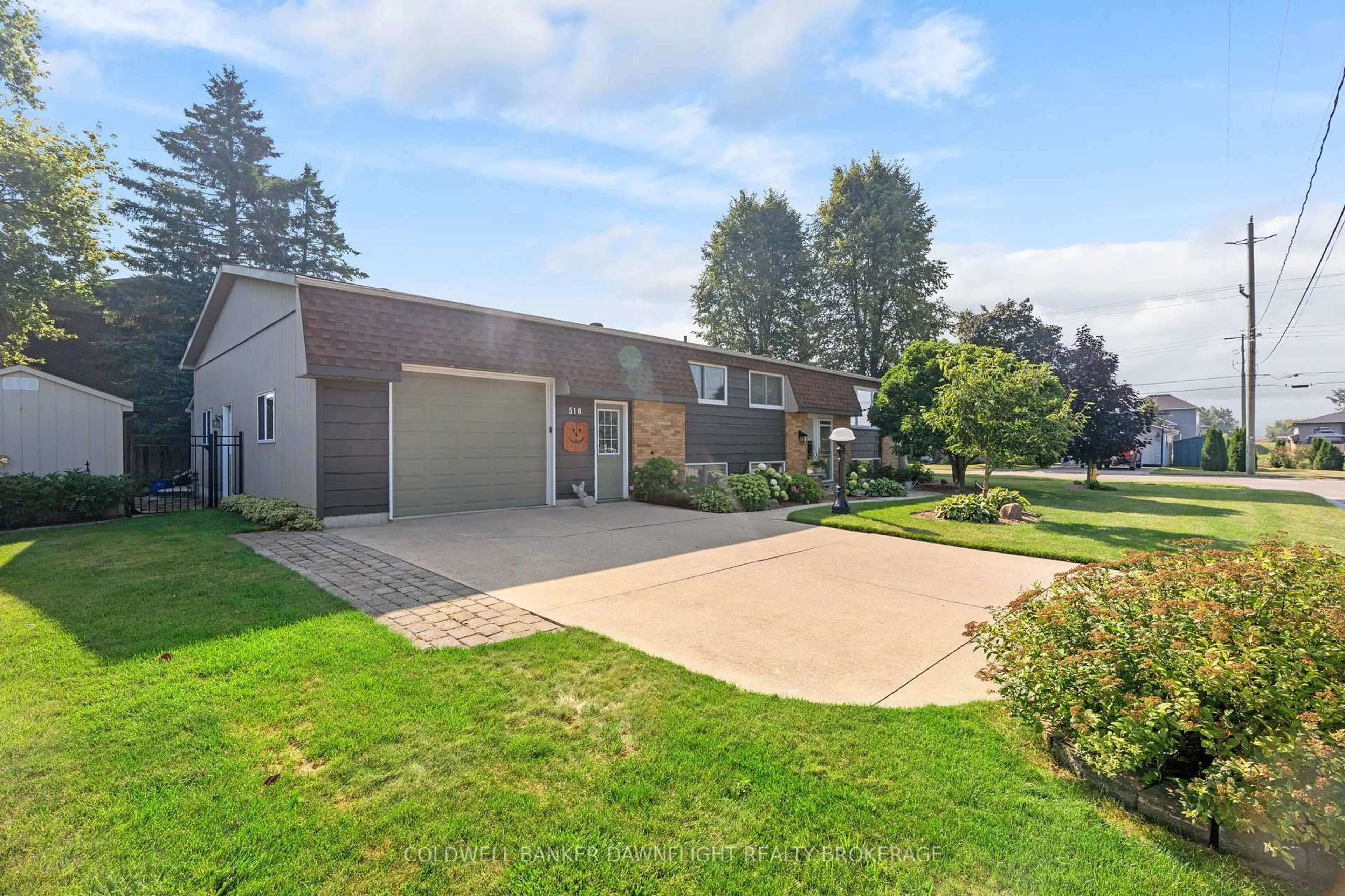 A pic from outside/outdoor area/front of a property/back of a property/a pic from drone, street for 518 Edward St, South Huron Ontario N0M 1S1