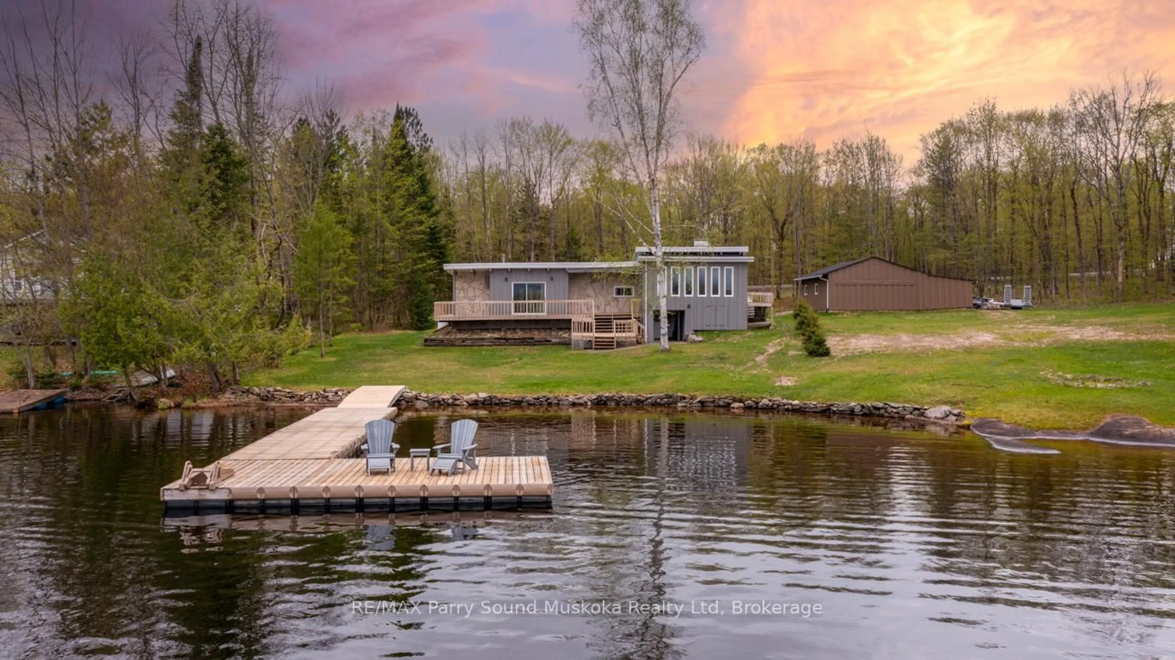 A pic from outside/outdoor area/front of a property/back of a property/a pic from drone, water/lake/river/ocean view for 179 MANITOU Dr, McKellar Ontario P2A 0B4