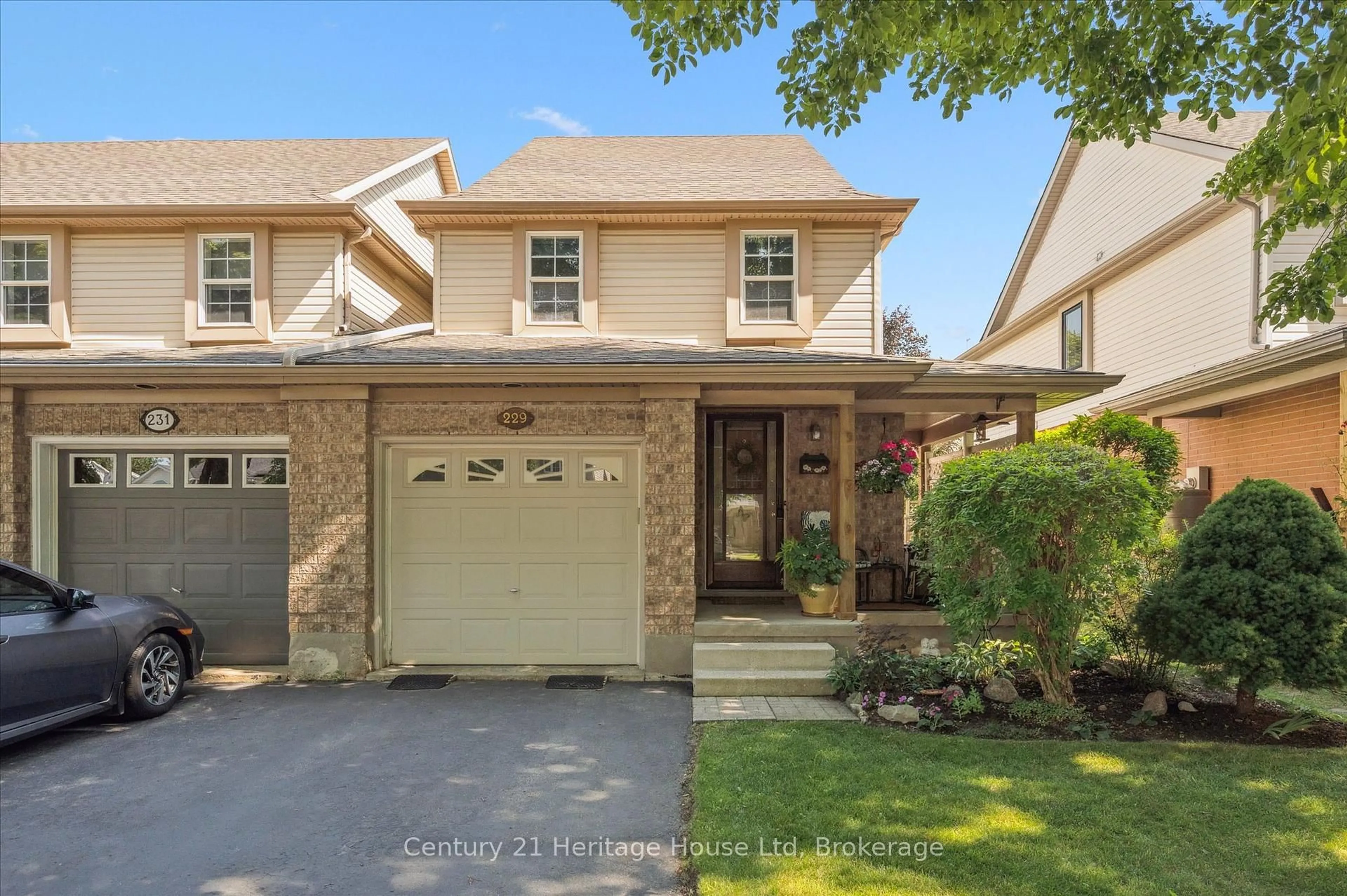Home with brick exterior material, street for 229 Silurian Dr, Guelph Ontario N1E 7B8