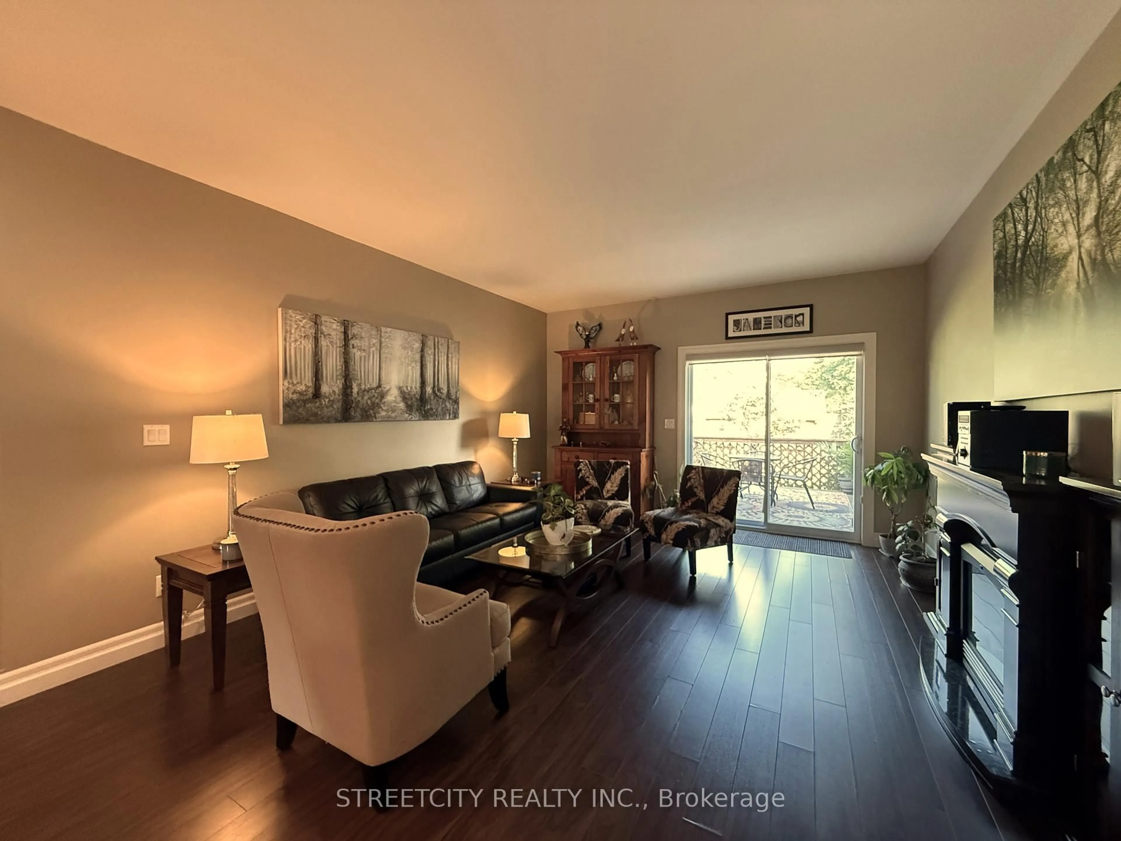 Living room with furniture, wood/laminate floor for 16 Leisure Lane, Chatham-Kent Ontario N0P 1M0