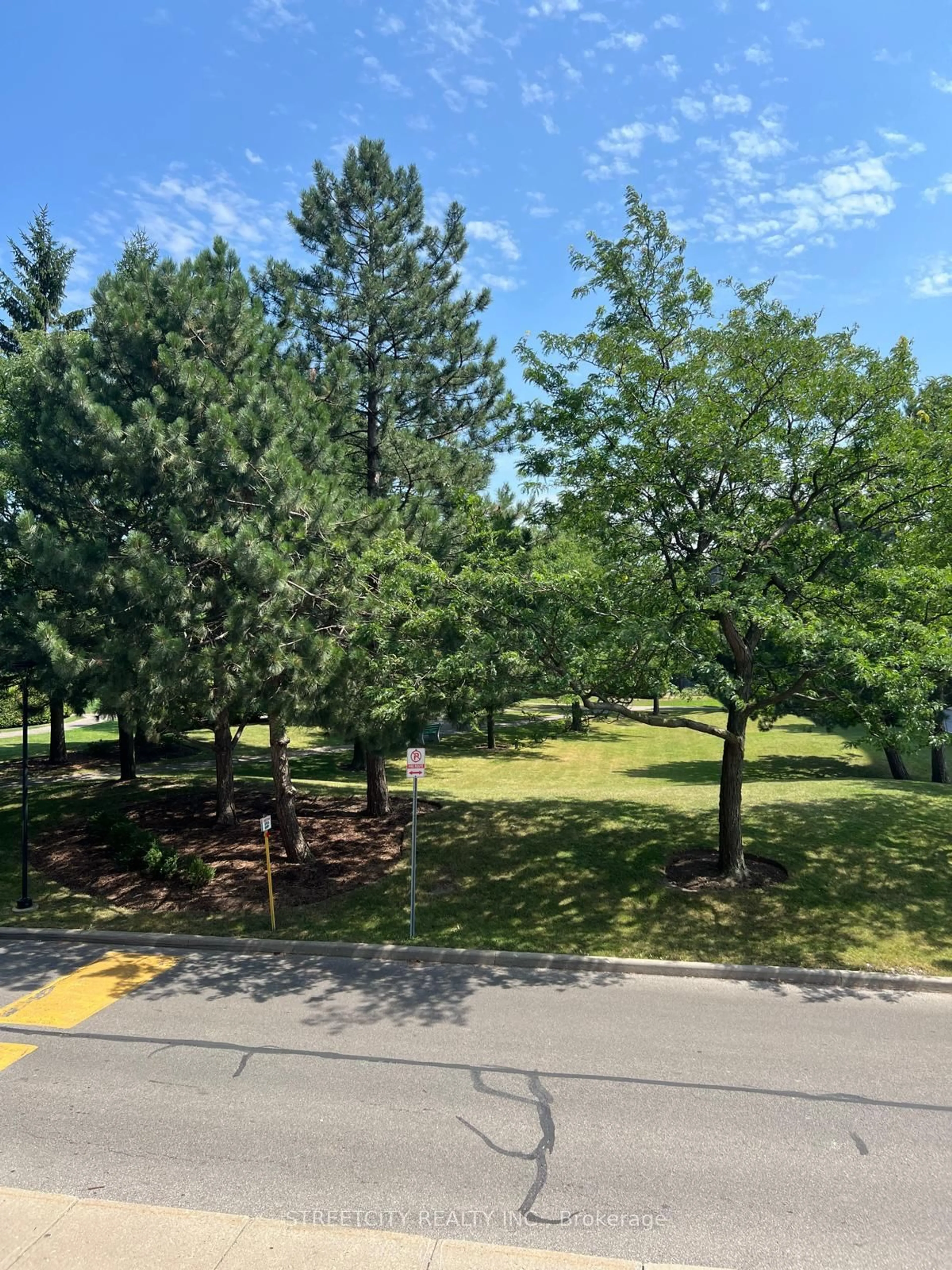 A pic from outside/outdoor area/front of a property/back of a property/a pic from drone, forest/trees view for 1103 Jalna Blvd #203, London South Ontario N6E 2W8