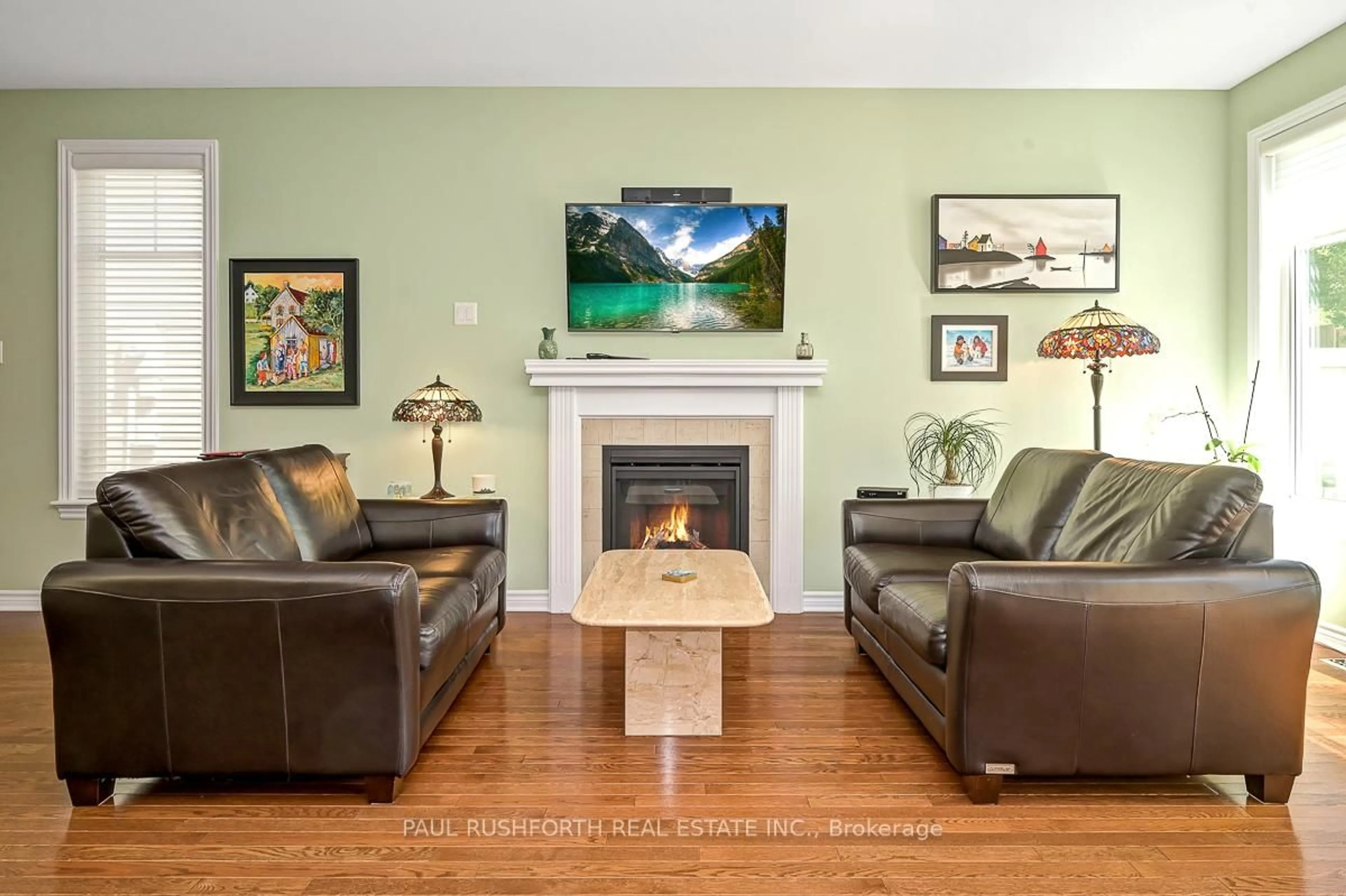 Living room with furniture, wood/laminate floor for 310 Mishawashkode St, Ottawa Ontario K4A 0Y8