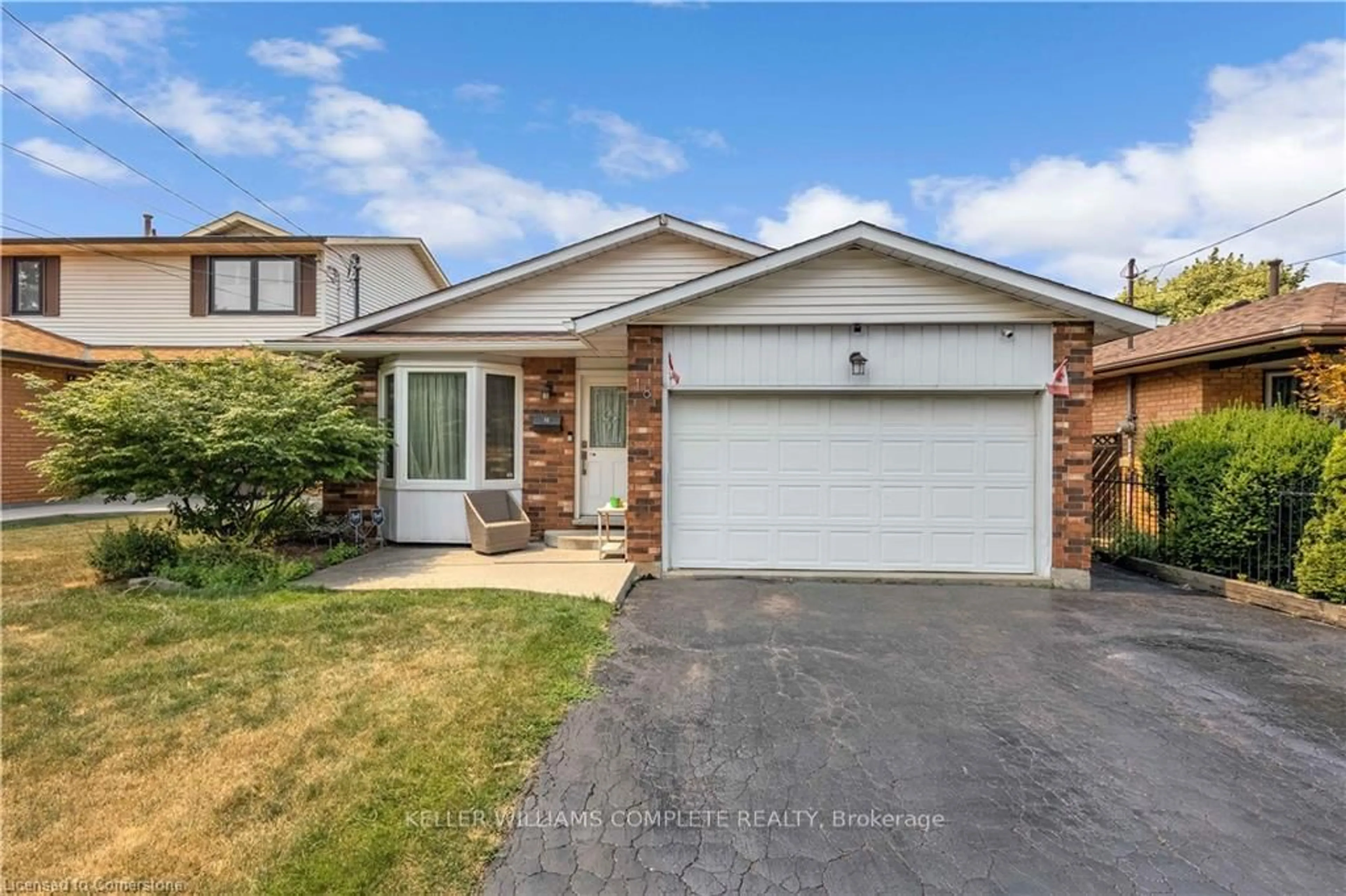 Home with brick exterior material, street for 18 Rosewell St, Hamilton Ontario L8W 2L1