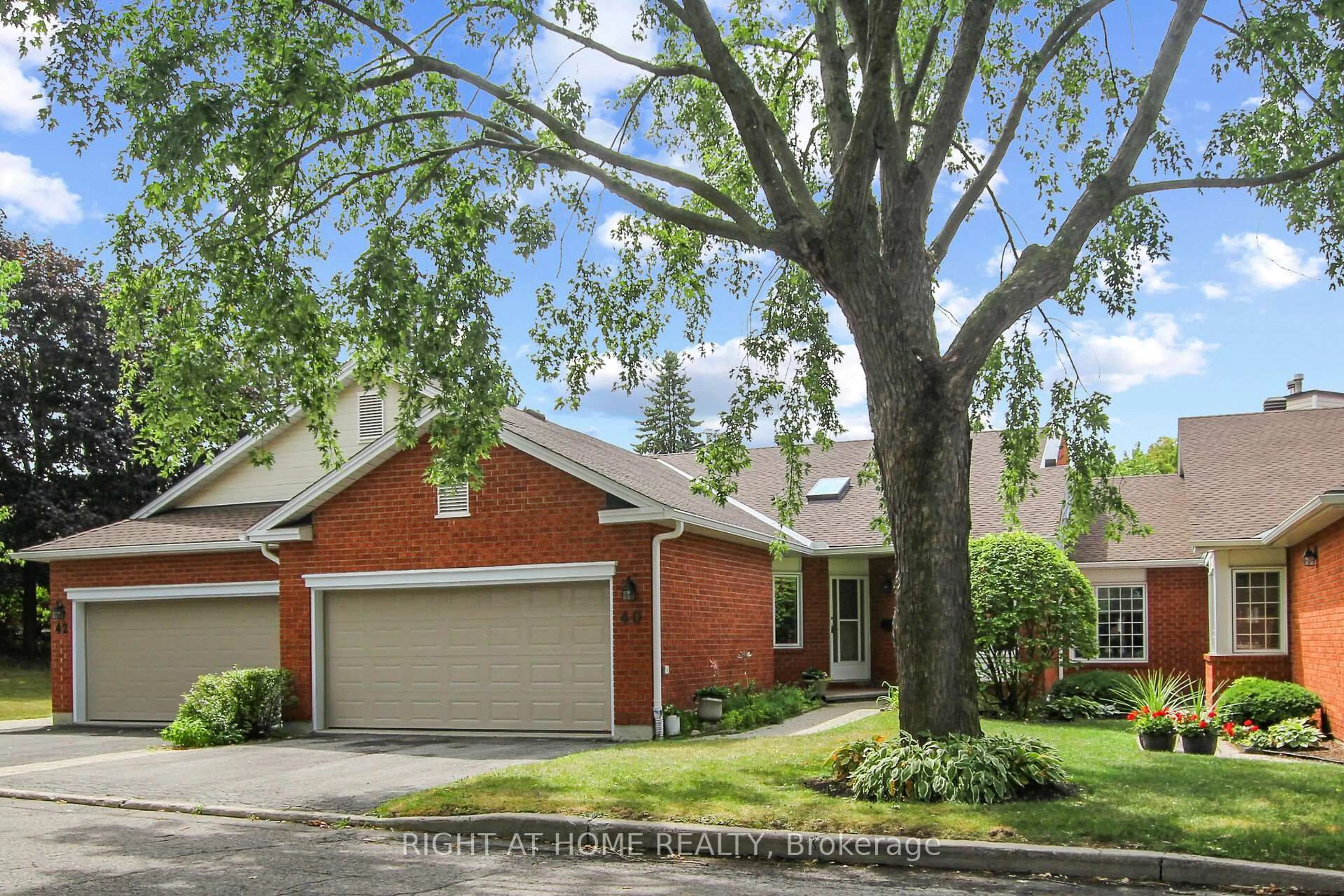 Home with brick exterior material, street for 40 Kettering Private, Ottawa Ontario K1V 0X8