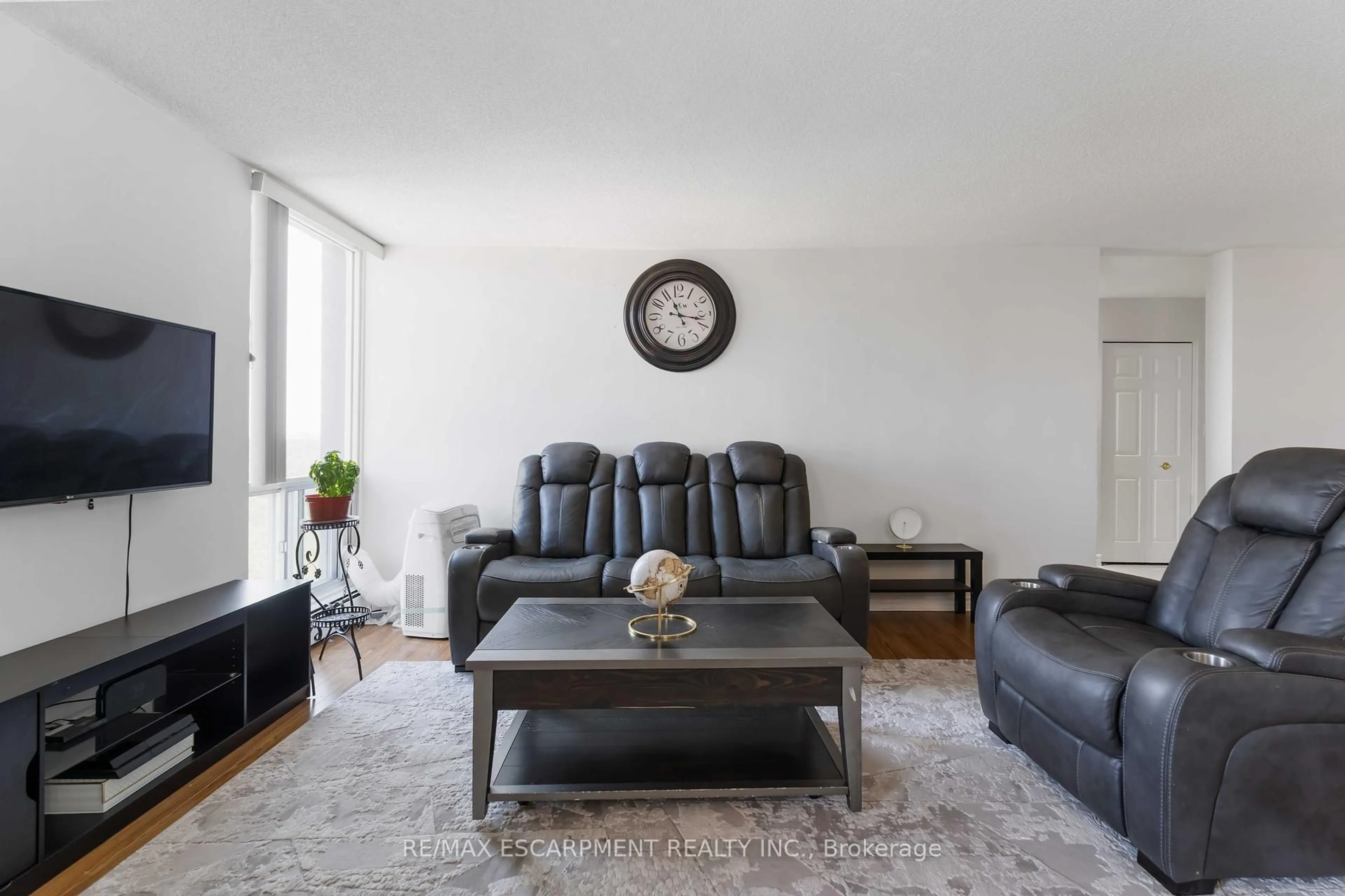 Living room with furniture, unknown for 75 Glenburn Crt #1004, Hamilton Ontario L8E 1C7