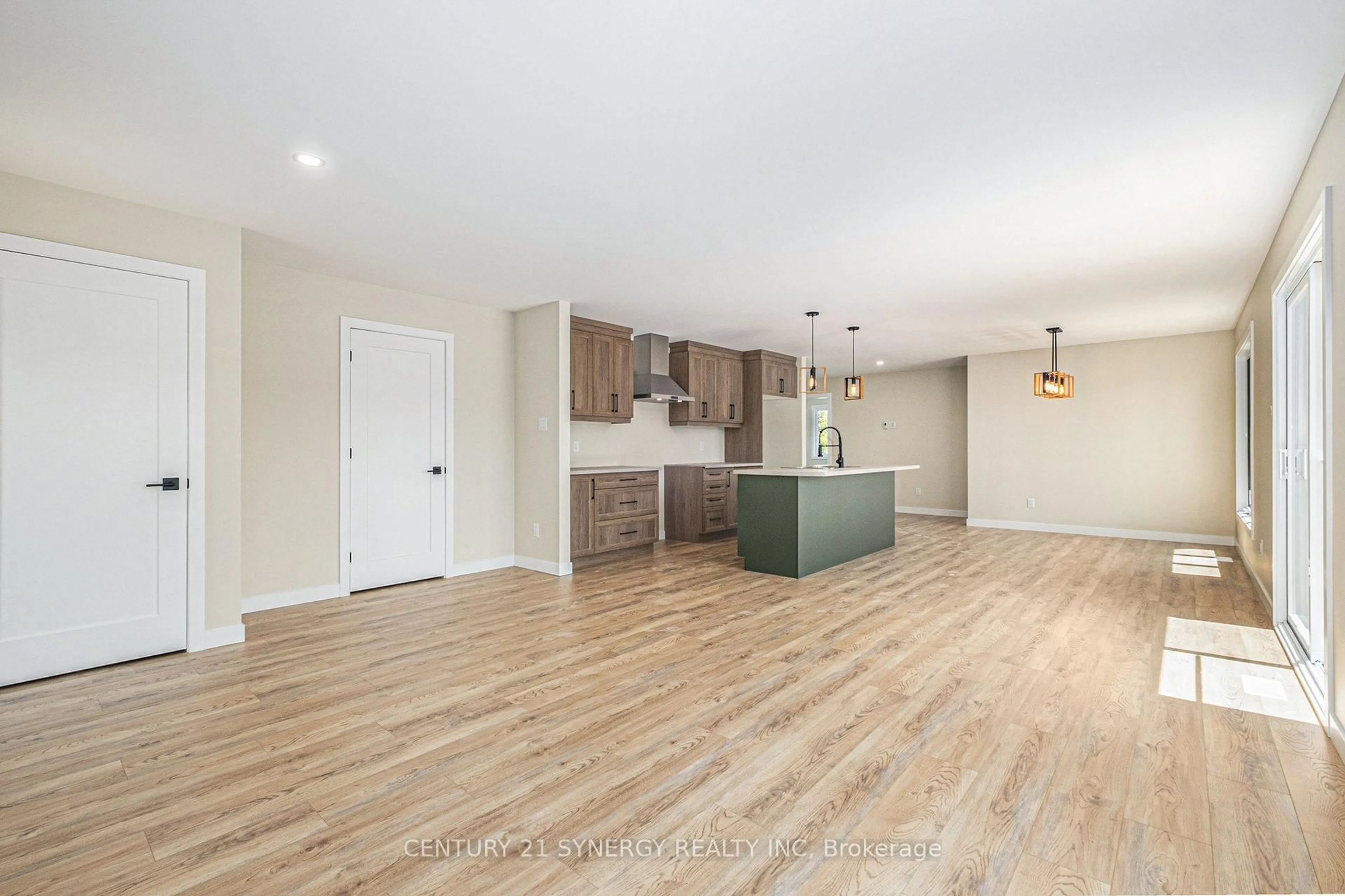 Open concept kitchen, wood/laminate floor for 16998 Chevrier St, North Stormont Ontario K0C 1V0