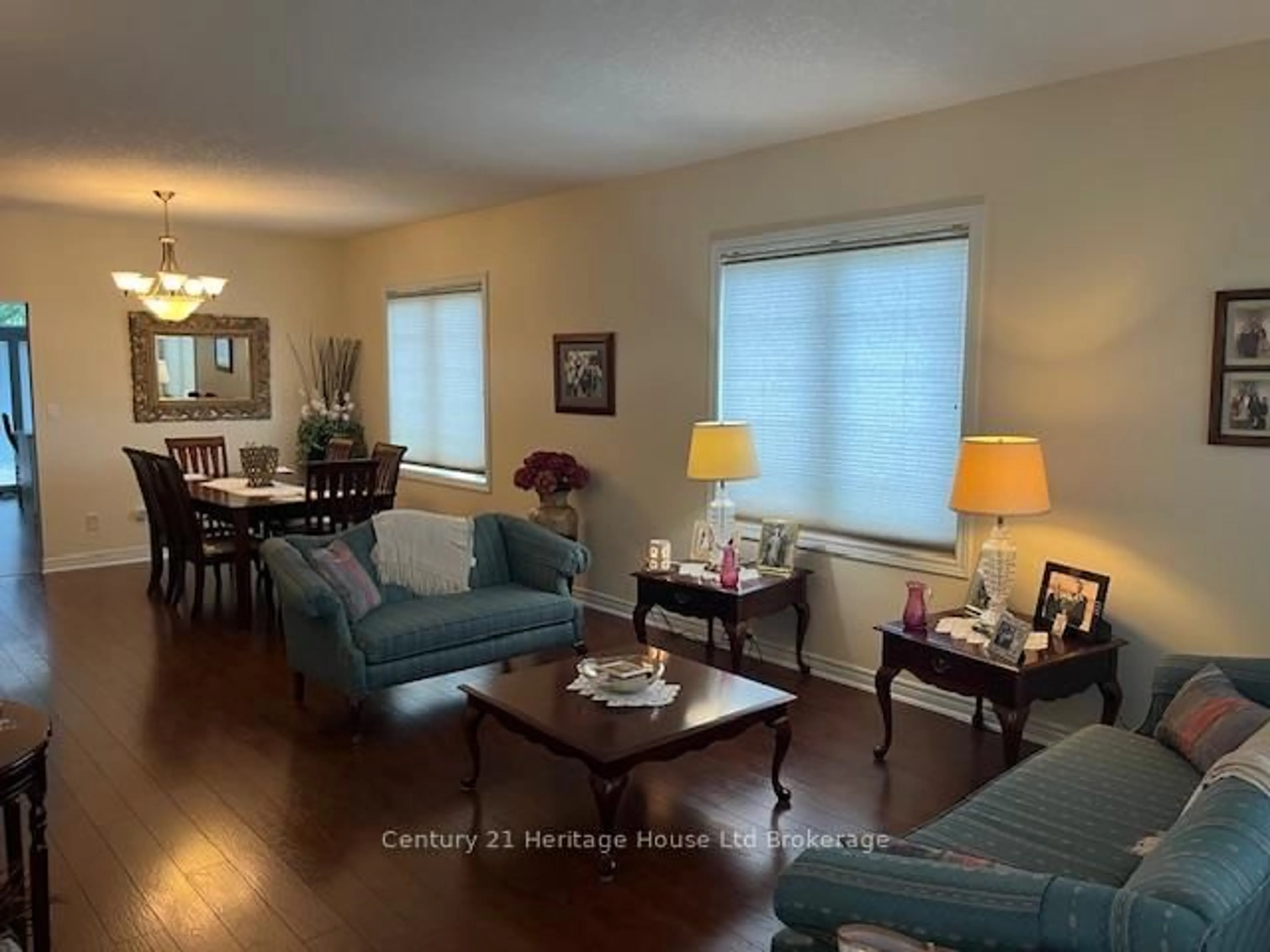 Living room with furniture, wood/laminate floor for 21 Balazs Crt #1, Tillsonburg Ontario N4G 5W6