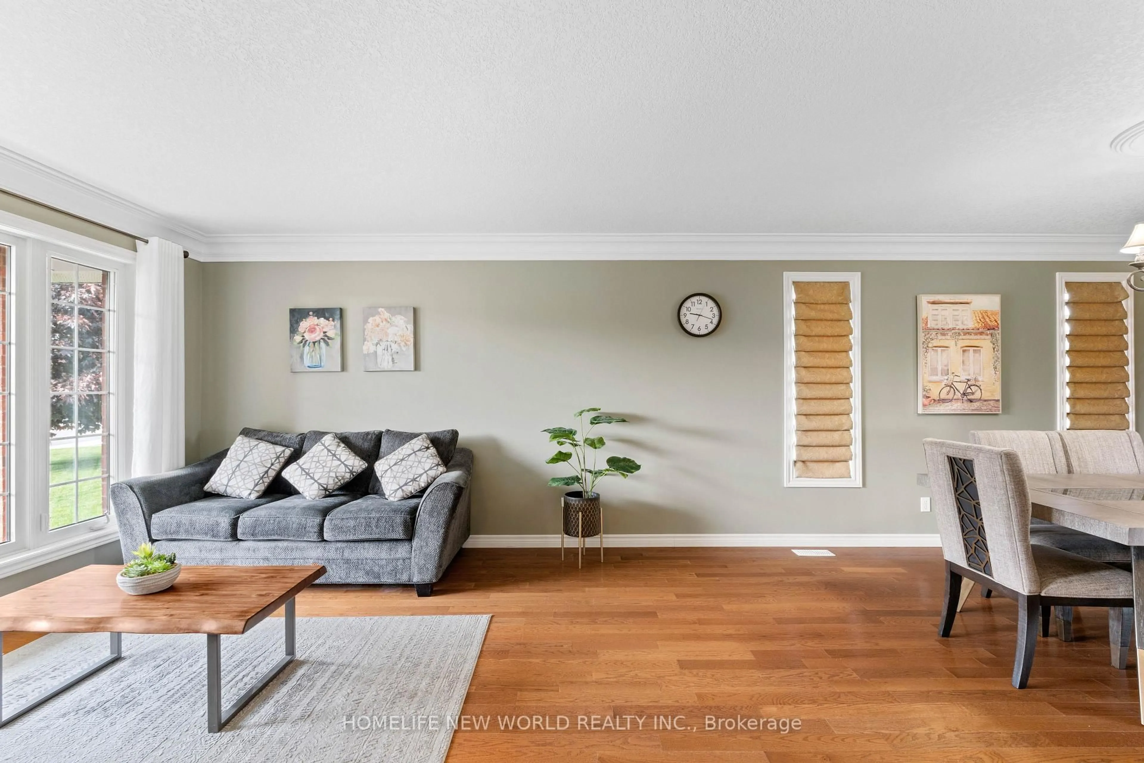 Living room with furniture, wood/laminate floor for 24 Kipling Dr, Belleville Ontario K8N 0C9
