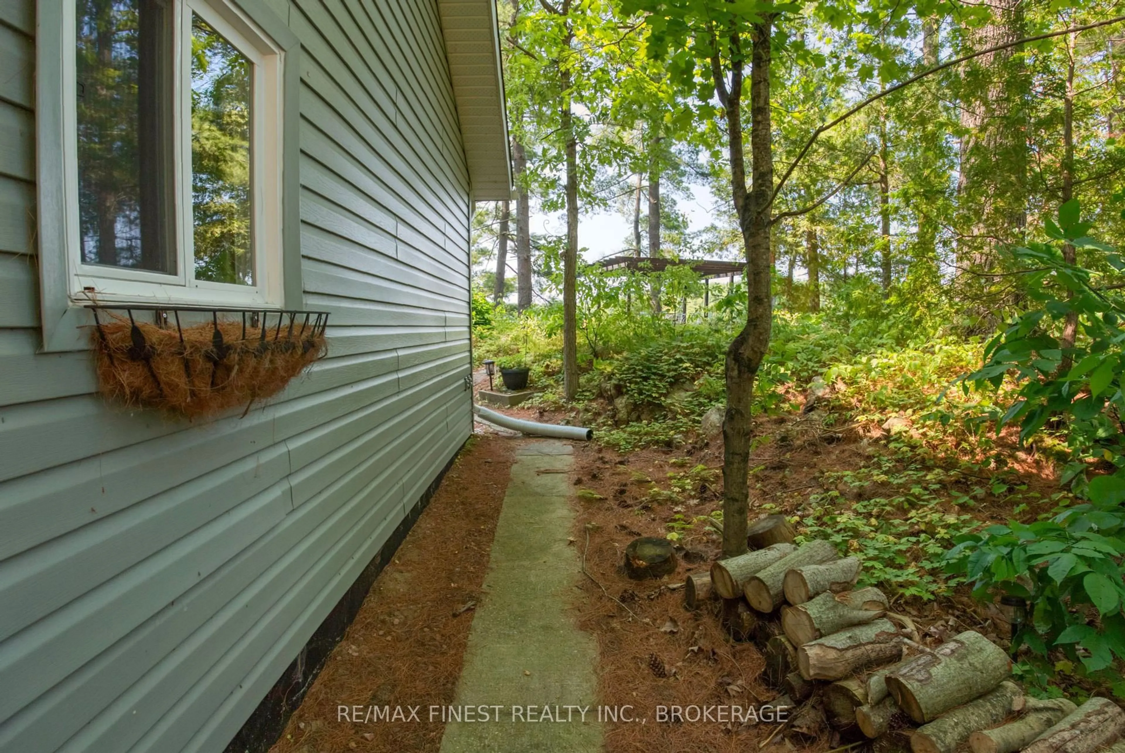 Patio, forest/trees view for 1036A Twin Lake Lane, Sharbot Lake Ontario K0H 2P0