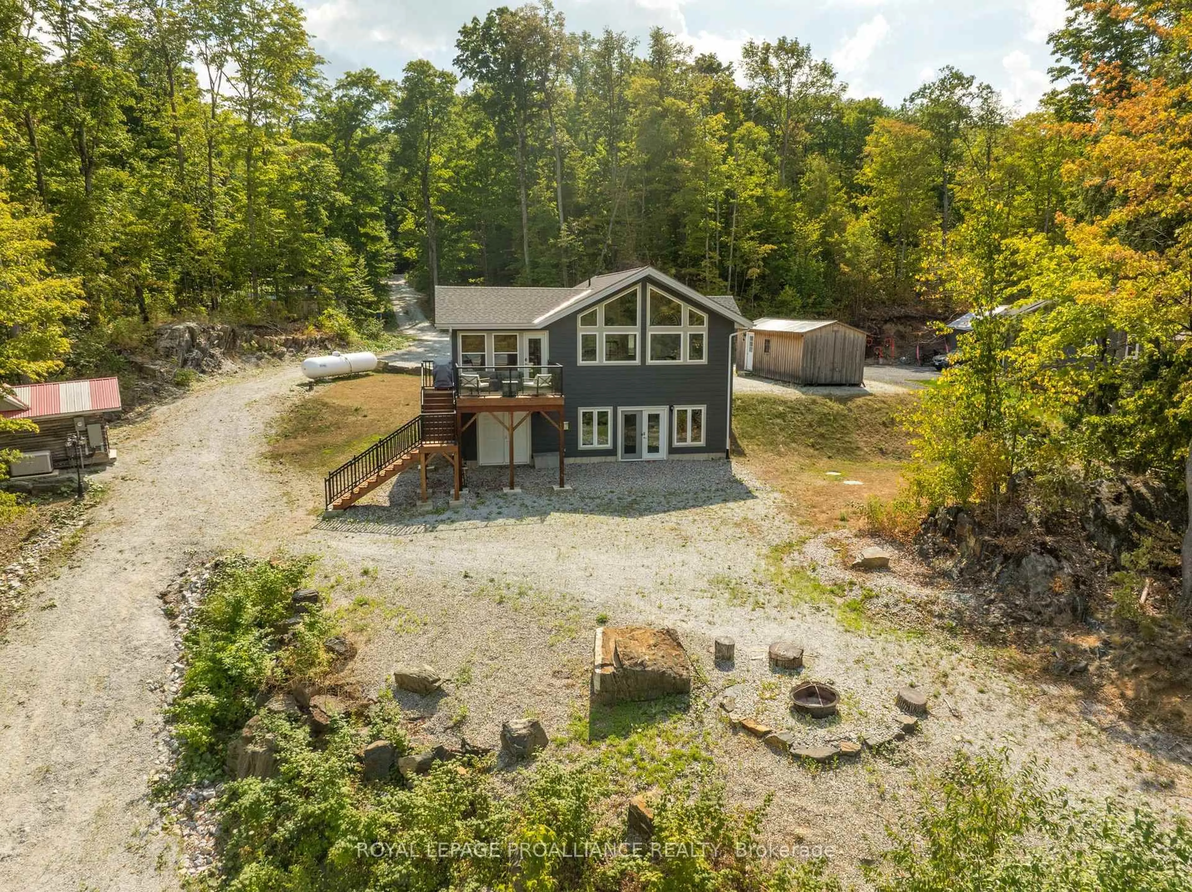 A pic from outside/outdoor area/front of a property/back of a property/a pic from drone, water/lake/river/ocean view for 1053C Granite Terrace Lane, Ompah Ontario K0H 2J0