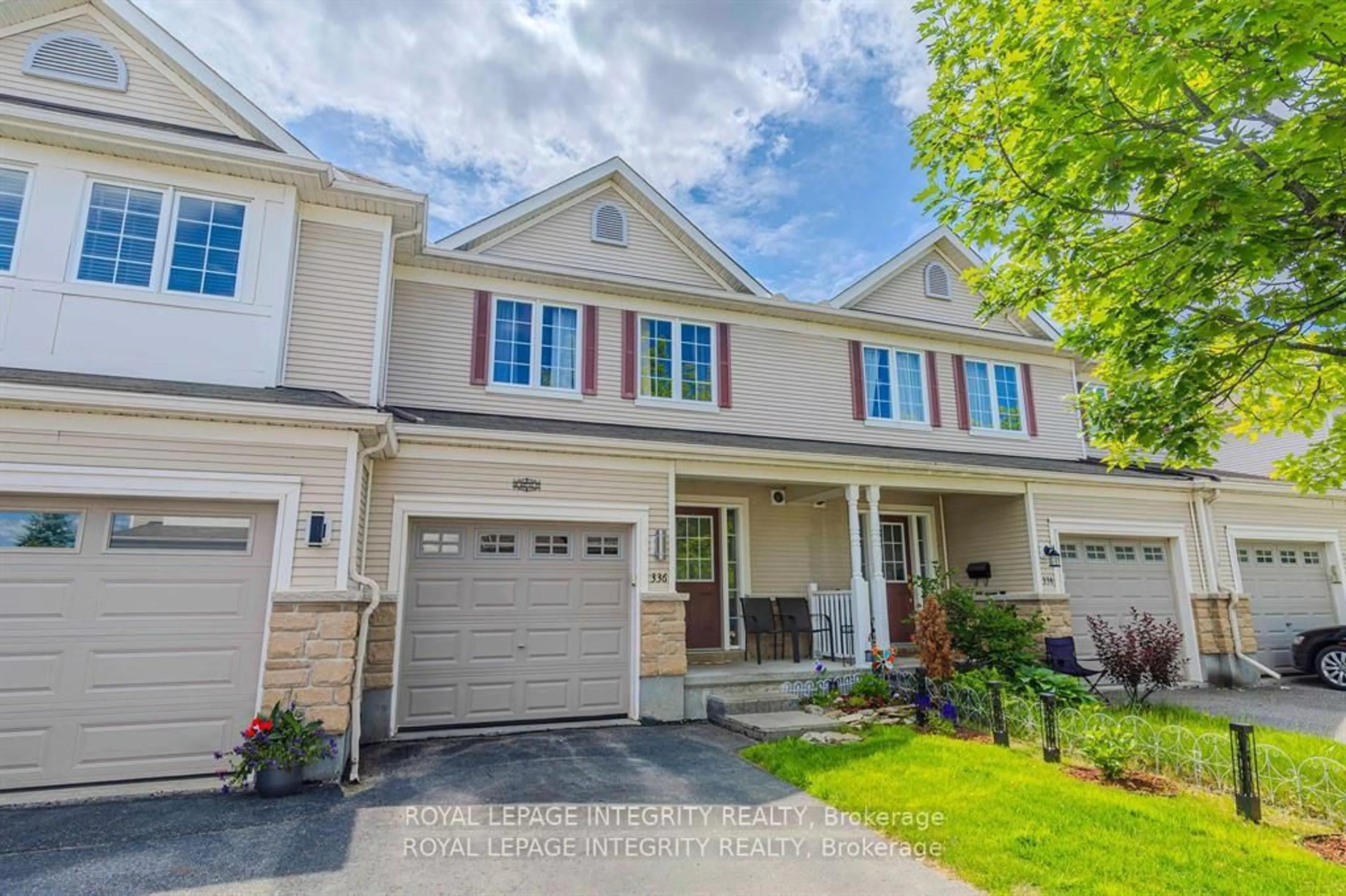 Home with vinyl exterior material, street for 336 Quetico Private, Ottawa Ontario K2J 0E5