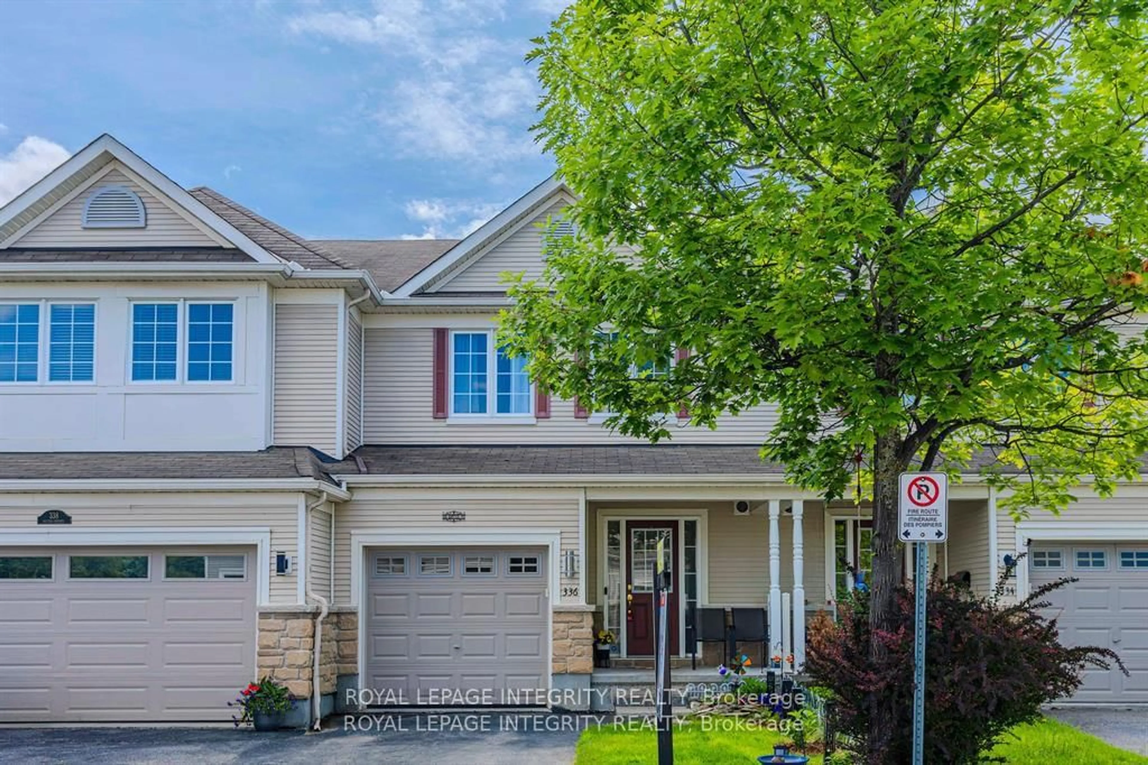 Home with vinyl exterior material, street for 336 Quetico Private, Ottawa Ontario K2J 0E5