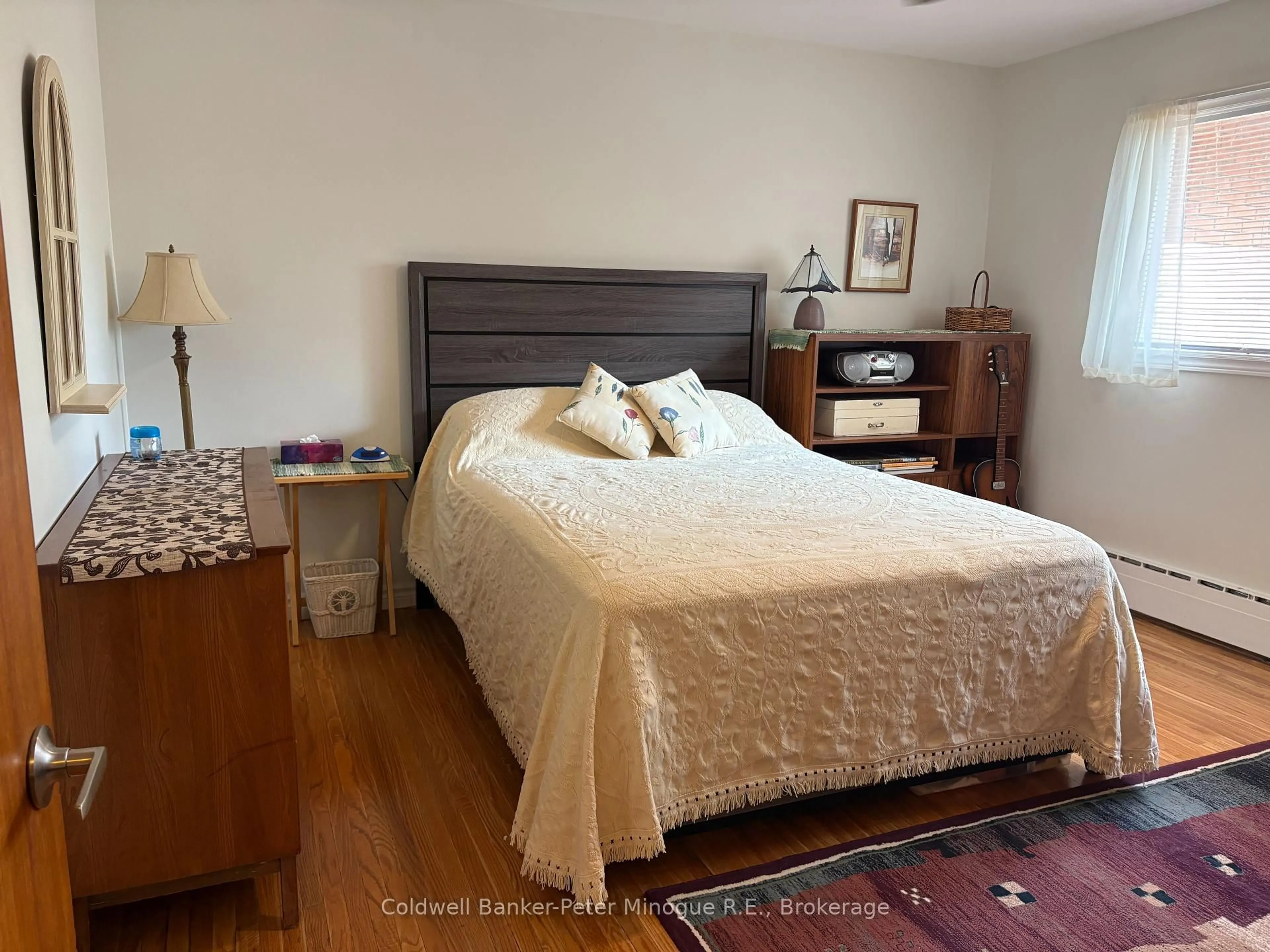 Bedroom with bed, wood/laminate floor for 40 Judge Ave #22, North Bay Ontario P1A 1B4