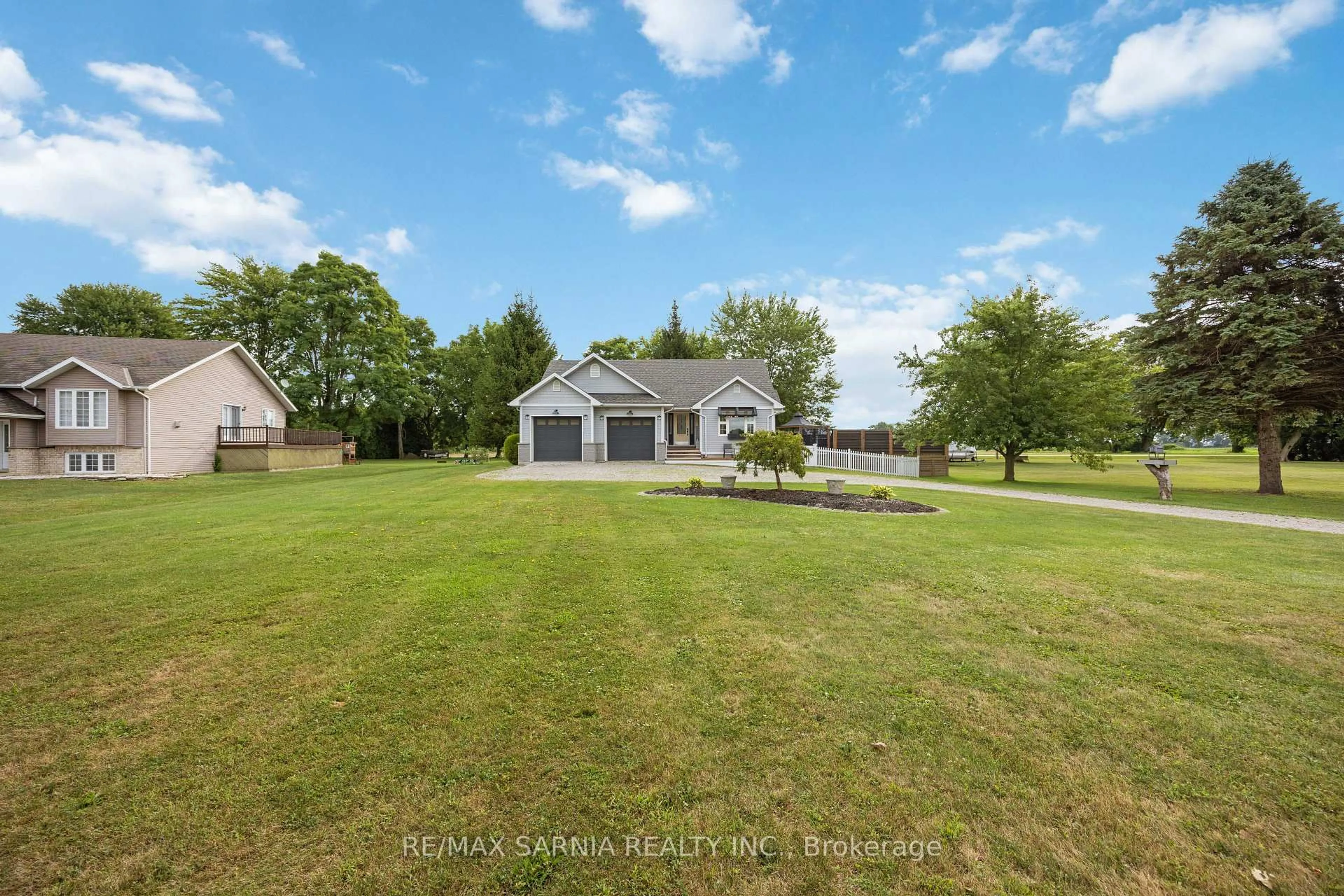 A pic from outside/outdoor area/front of a property/back of a property/a pic from drone, water/lake/river/ocean view for 29597 St. Clair Pkwy, Chatham-Kent Ontario N8A 4L1