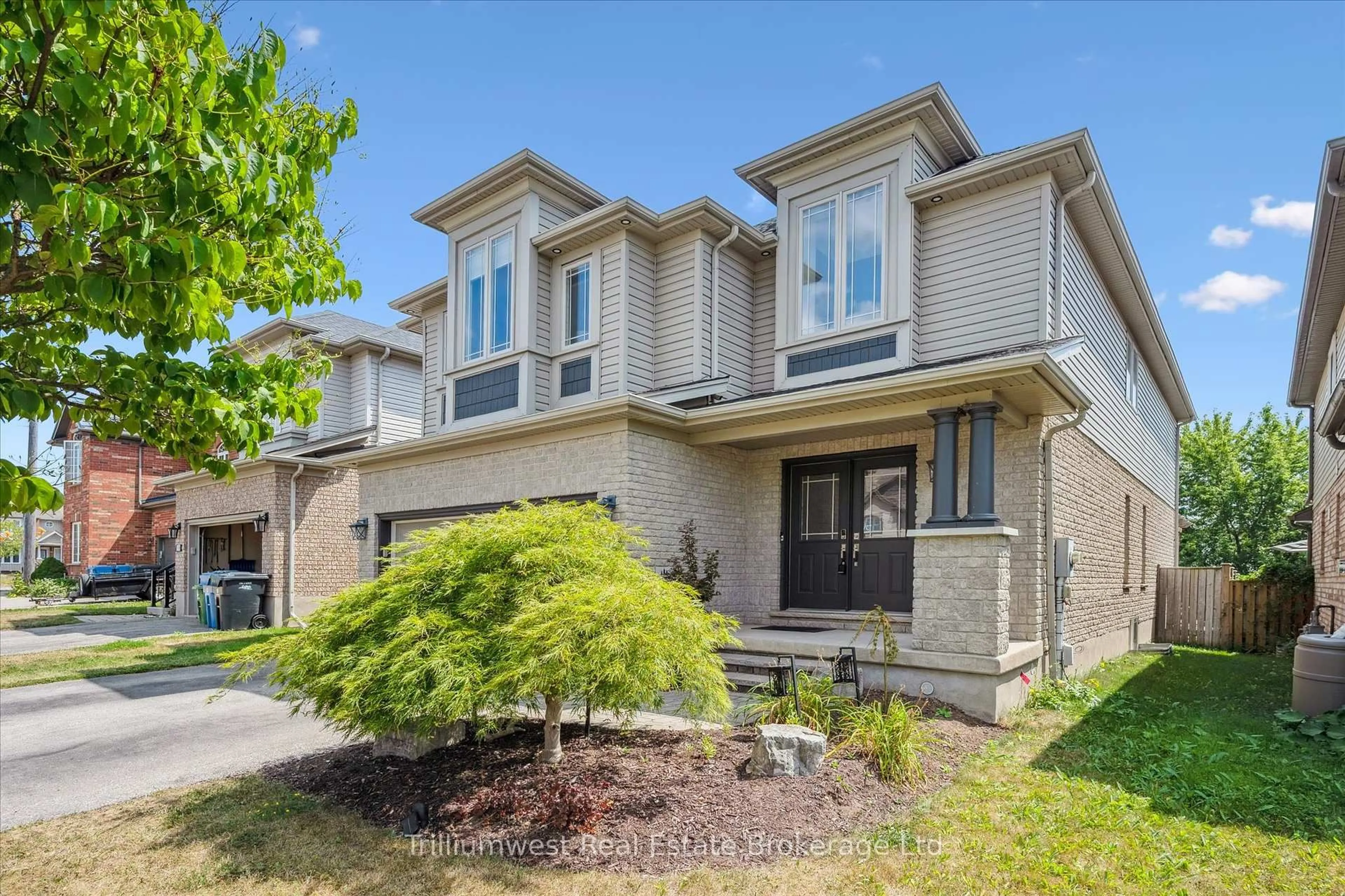 Home with brick exterior material, street for 117 Simmonds Dr, Guelph Ontario N1E 7L8