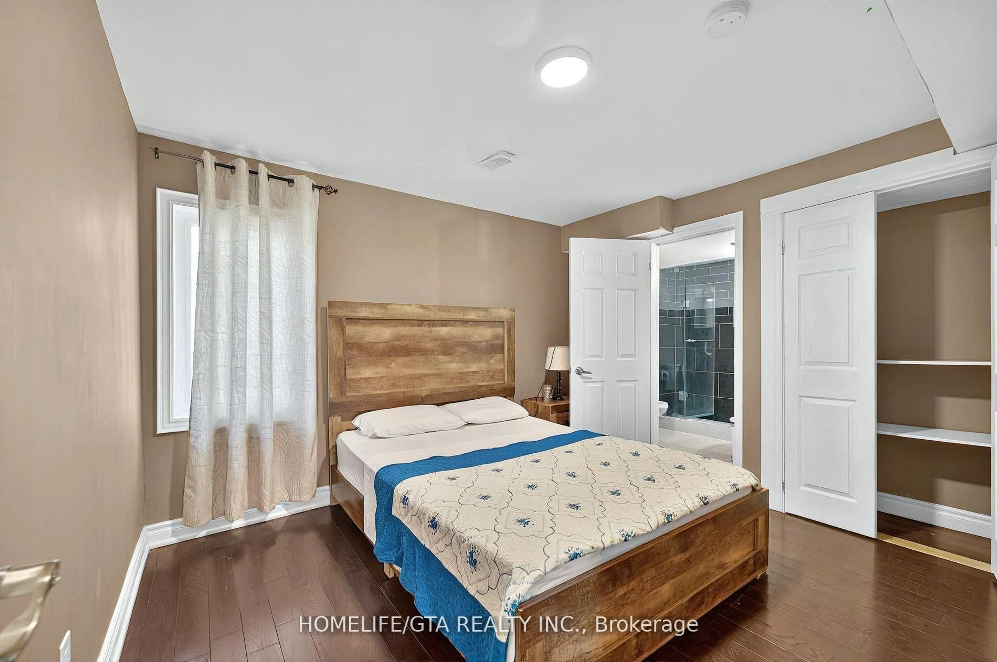 Bedroom with bed, wood/laminate floor for 9334 County Road 2, Hamilton Township Ontario K9A 4J8