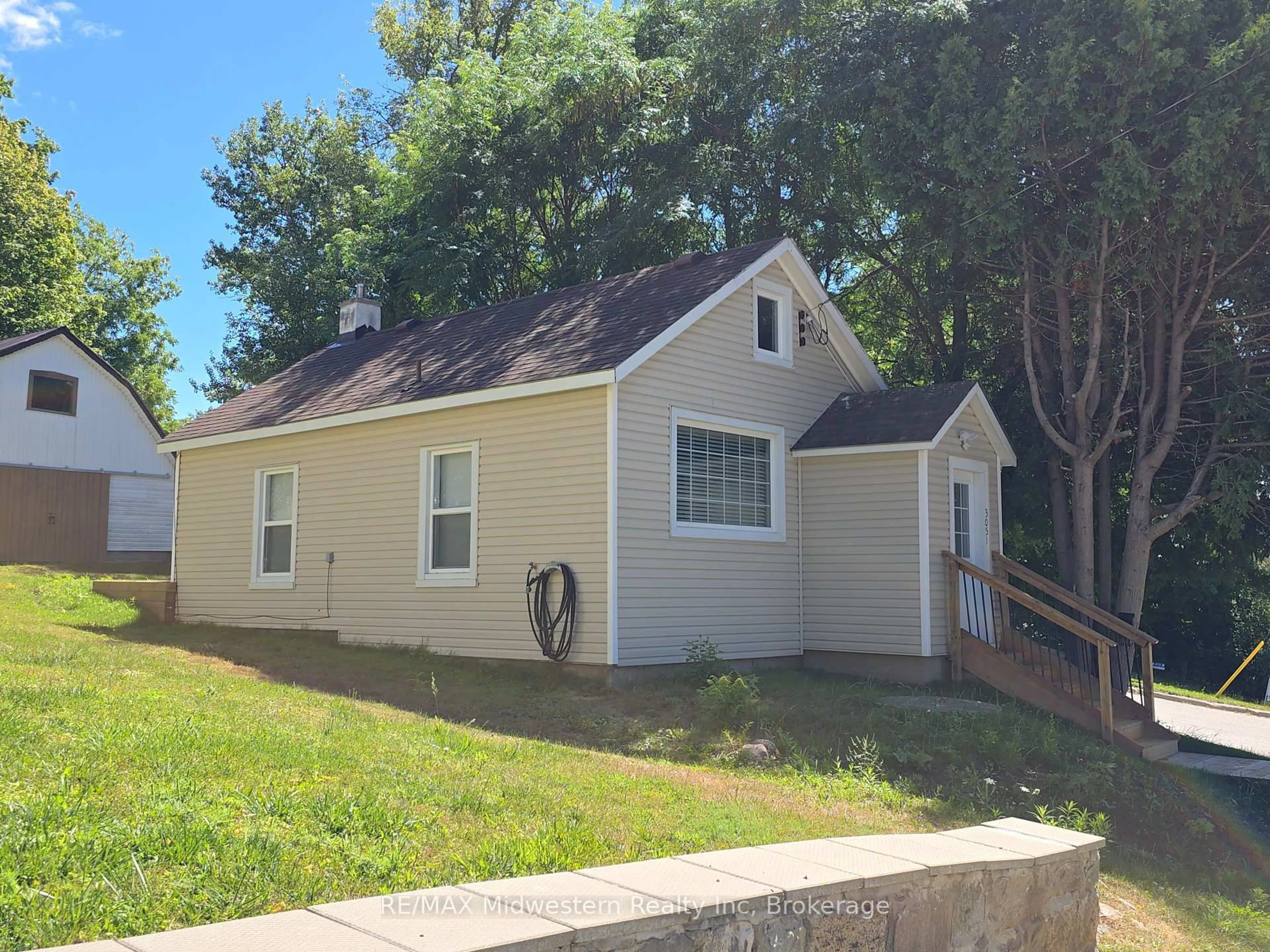 Home with vinyl exterior material, street for 3089 Patrick St, Howick Ontario N0G 1V0
