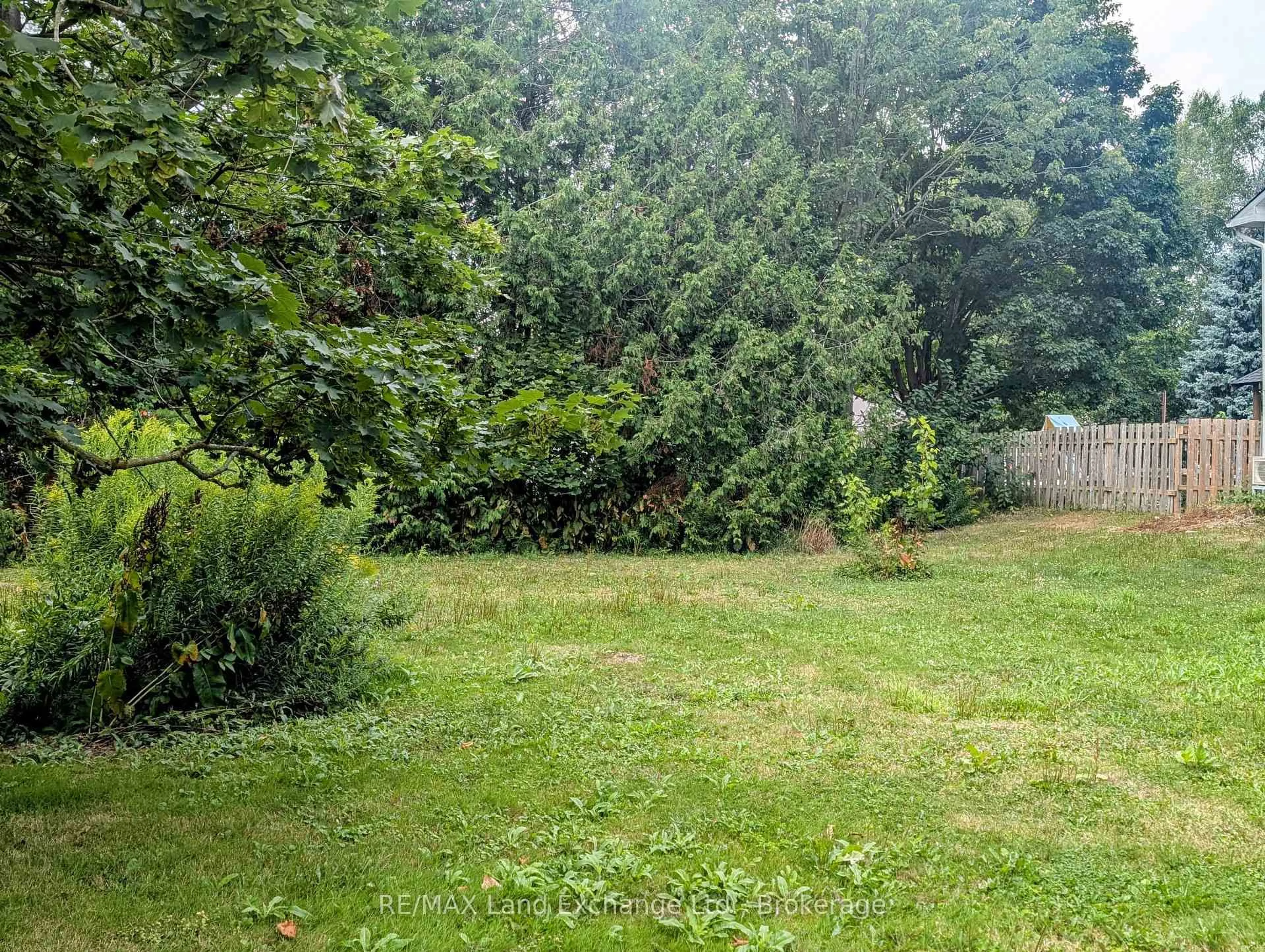 A pic from outside/outdoor area/front of a property/back of a property/a pic from drone, forest/trees view for 431 Coombs St, North Huron Ontario N0M 1H0