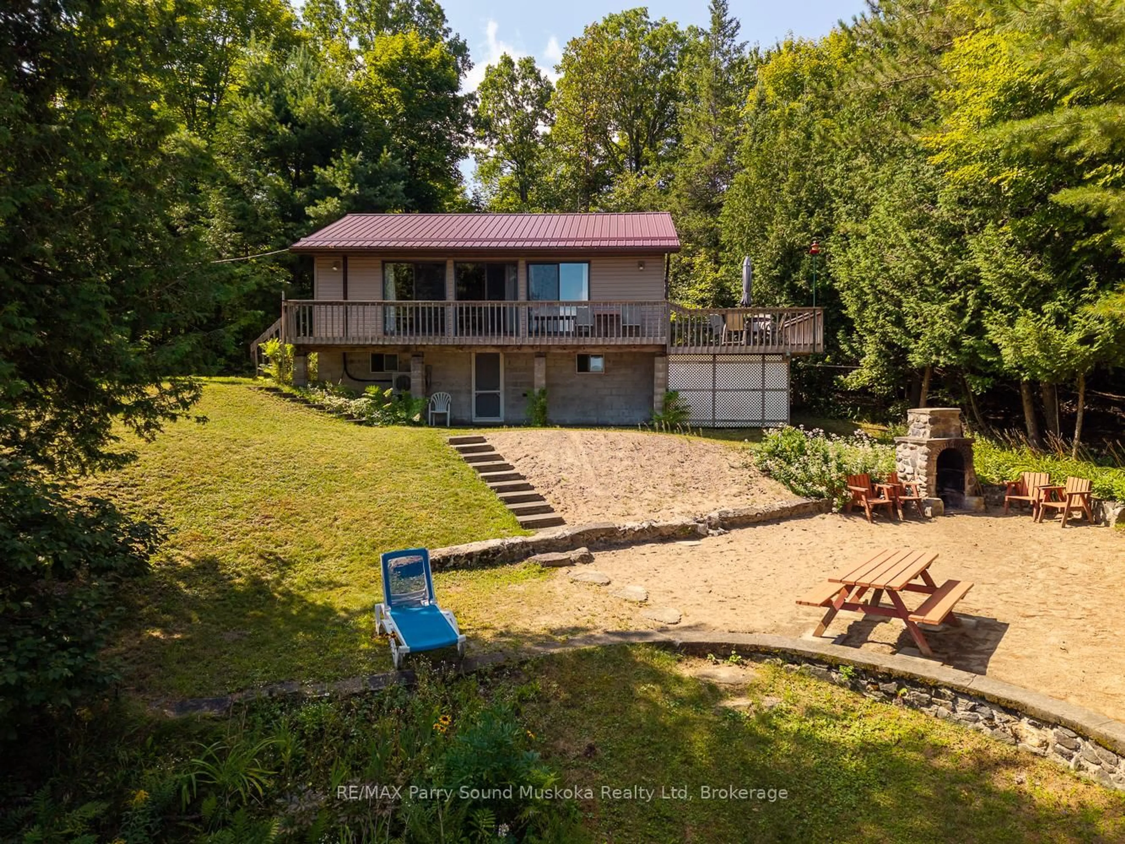 A pic from outside/outdoor area/front of a property/back of a property/a pic from drone, water/lake/river/ocean view for 28 Stormy Point Rd, McKellar Ontario P2A 0B5