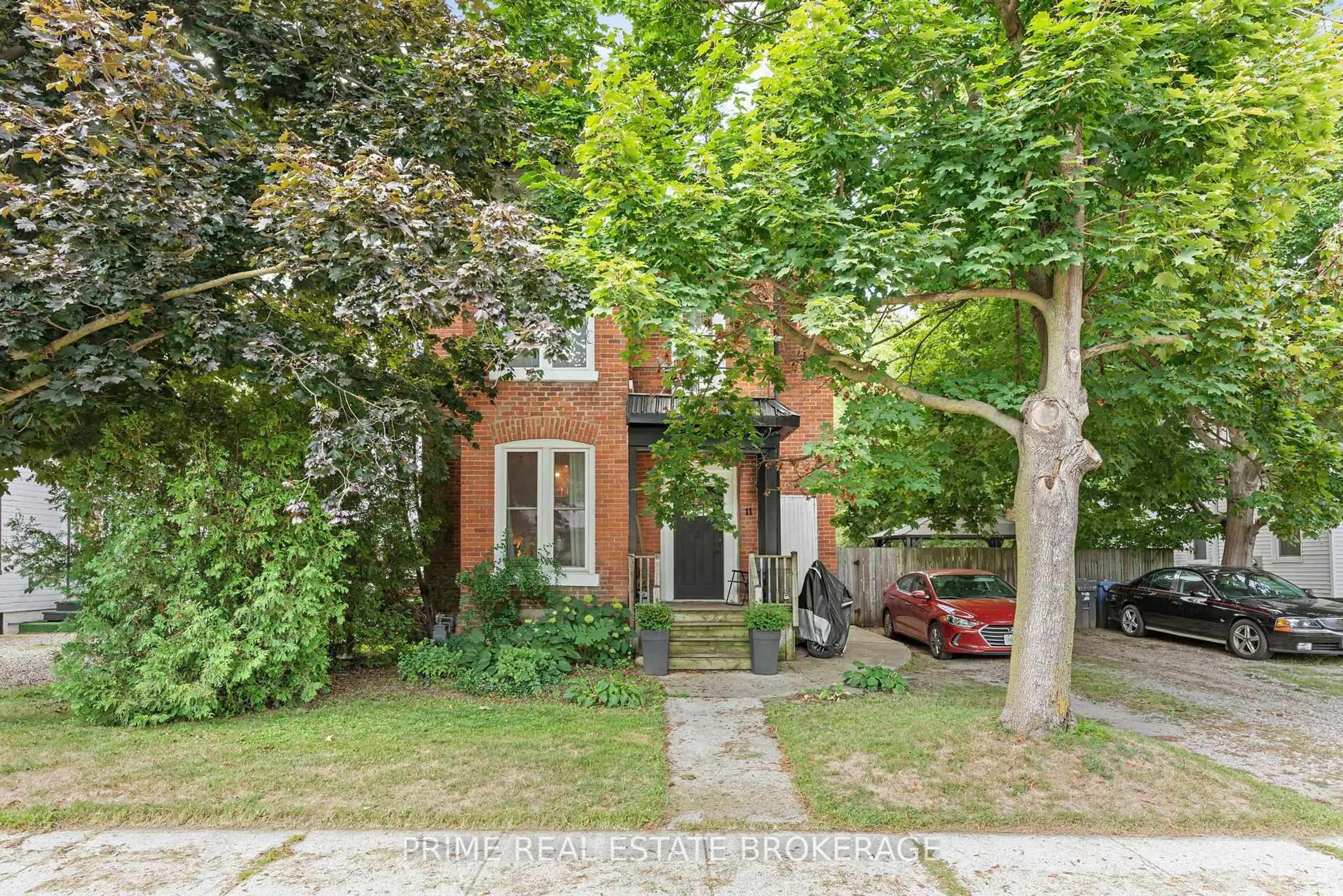 Home with brick exterior material, street for 11 Maple St, Aylmer Ontario N5H 1B8