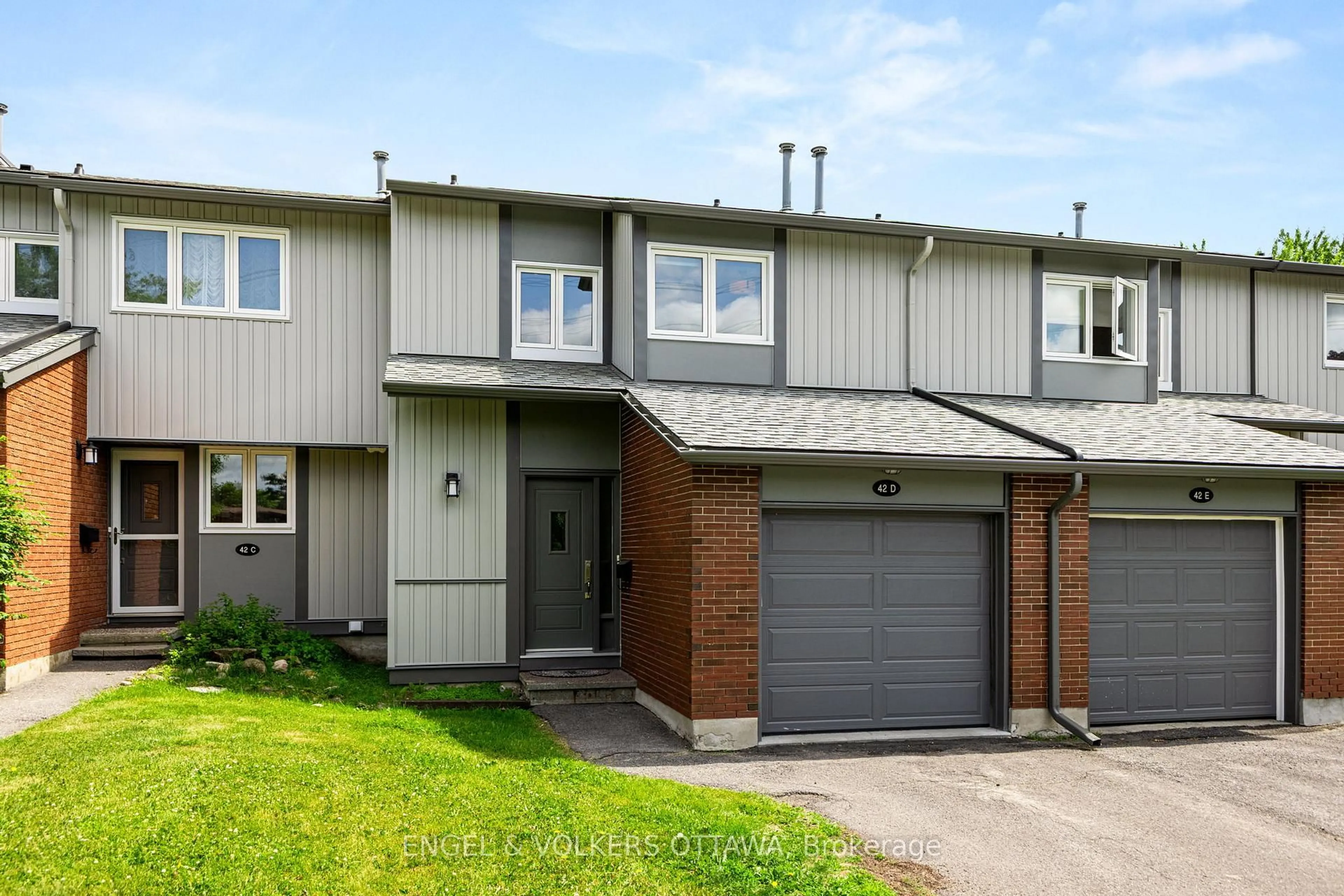 Home with vinyl exterior material, street for 42D Benlea Dr, Ottawa Ontario K2G 4A9