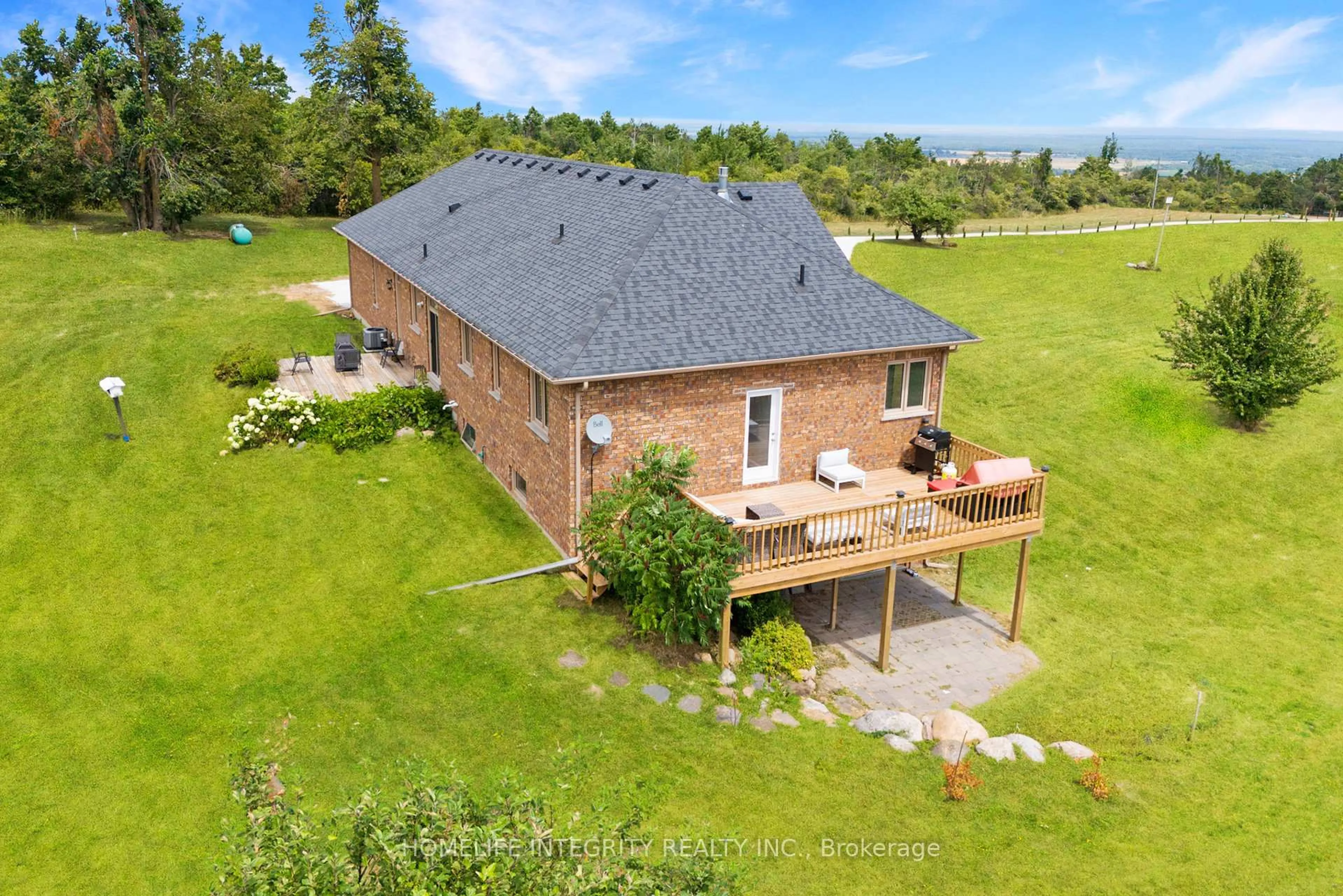 A pic from outside/outdoor area/front of a property/back of a property/a pic from drone, unknown for 838722 4th Line, Mulmur Ontario L9V 0J7