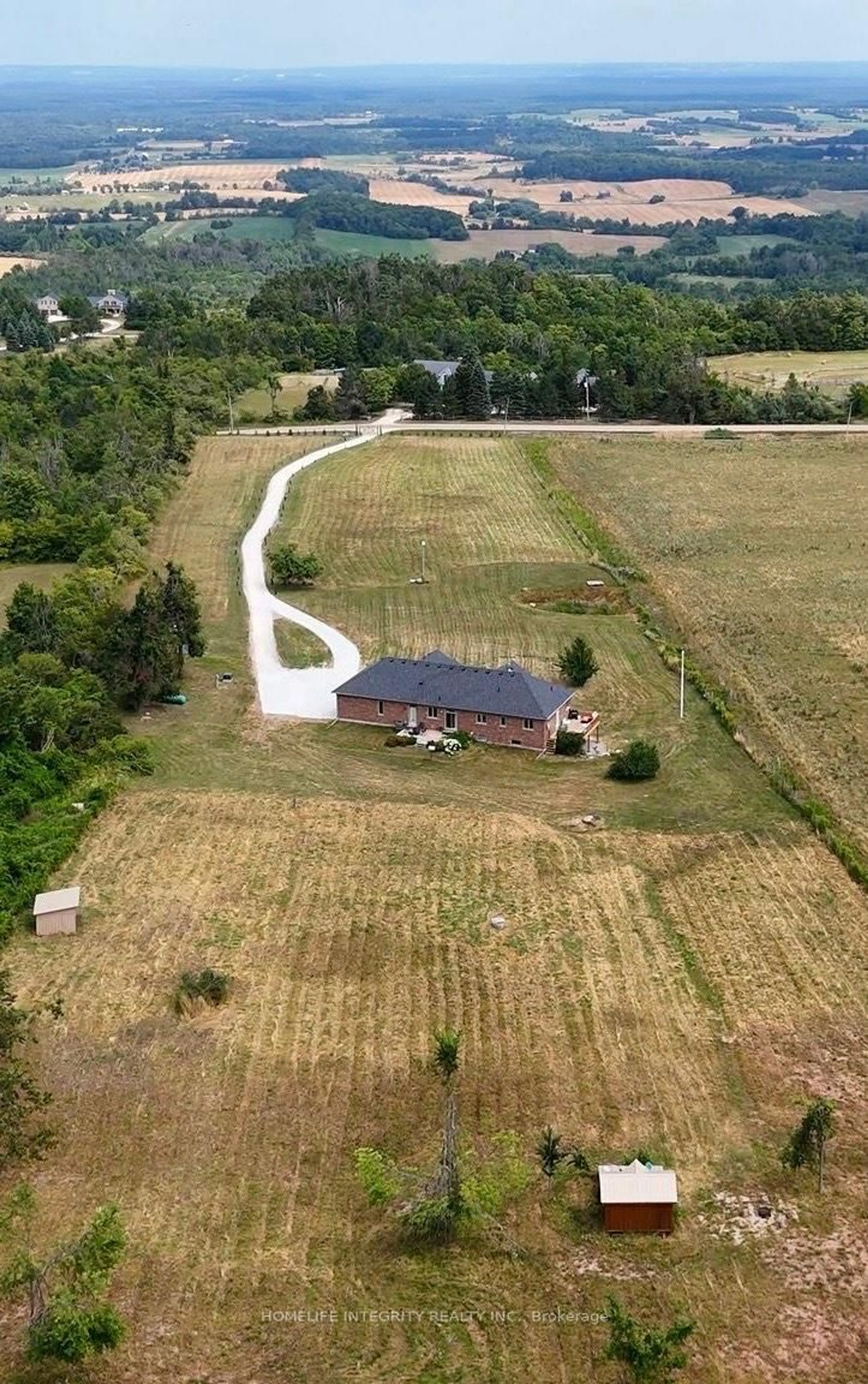 A pic from outside/outdoor area/front of a property/back of a property/a pic from drone, unknown for 838722 4th Line, Mulmur Ontario L9V 0J7