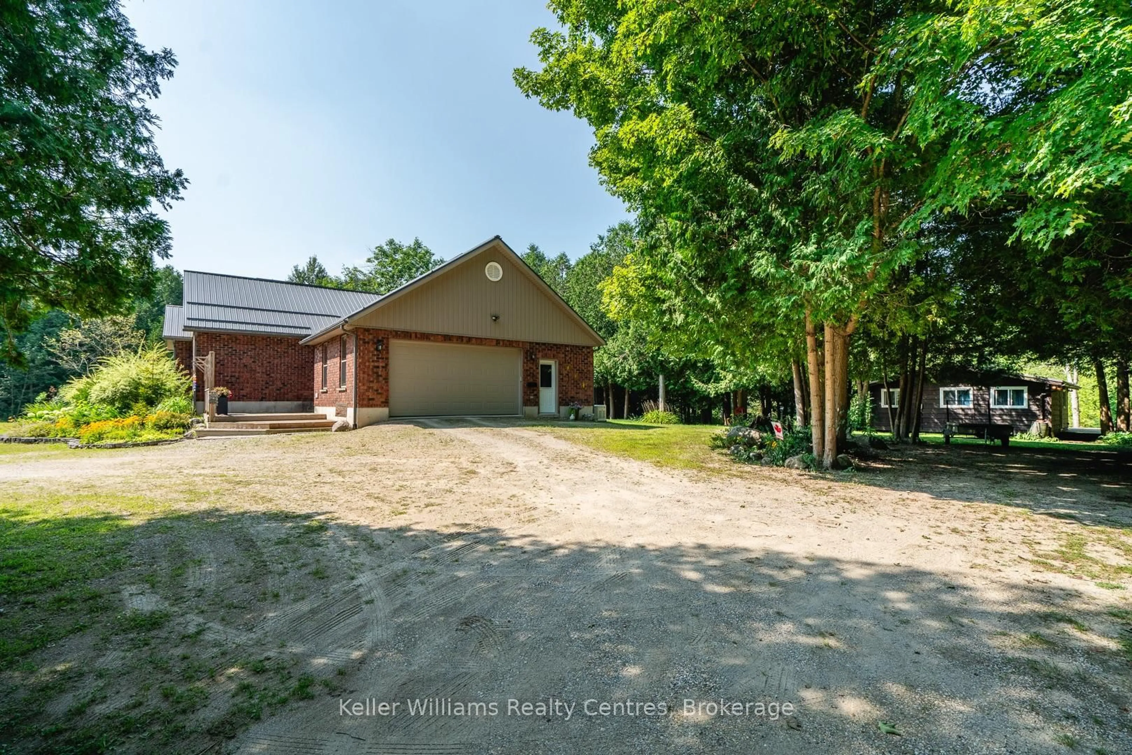 A pic from outside/outdoor area/front of a property/back of a property/a pic from drone, street for 034660 Sideroad 5 NDR, West Grey Ontario N0G 1S0