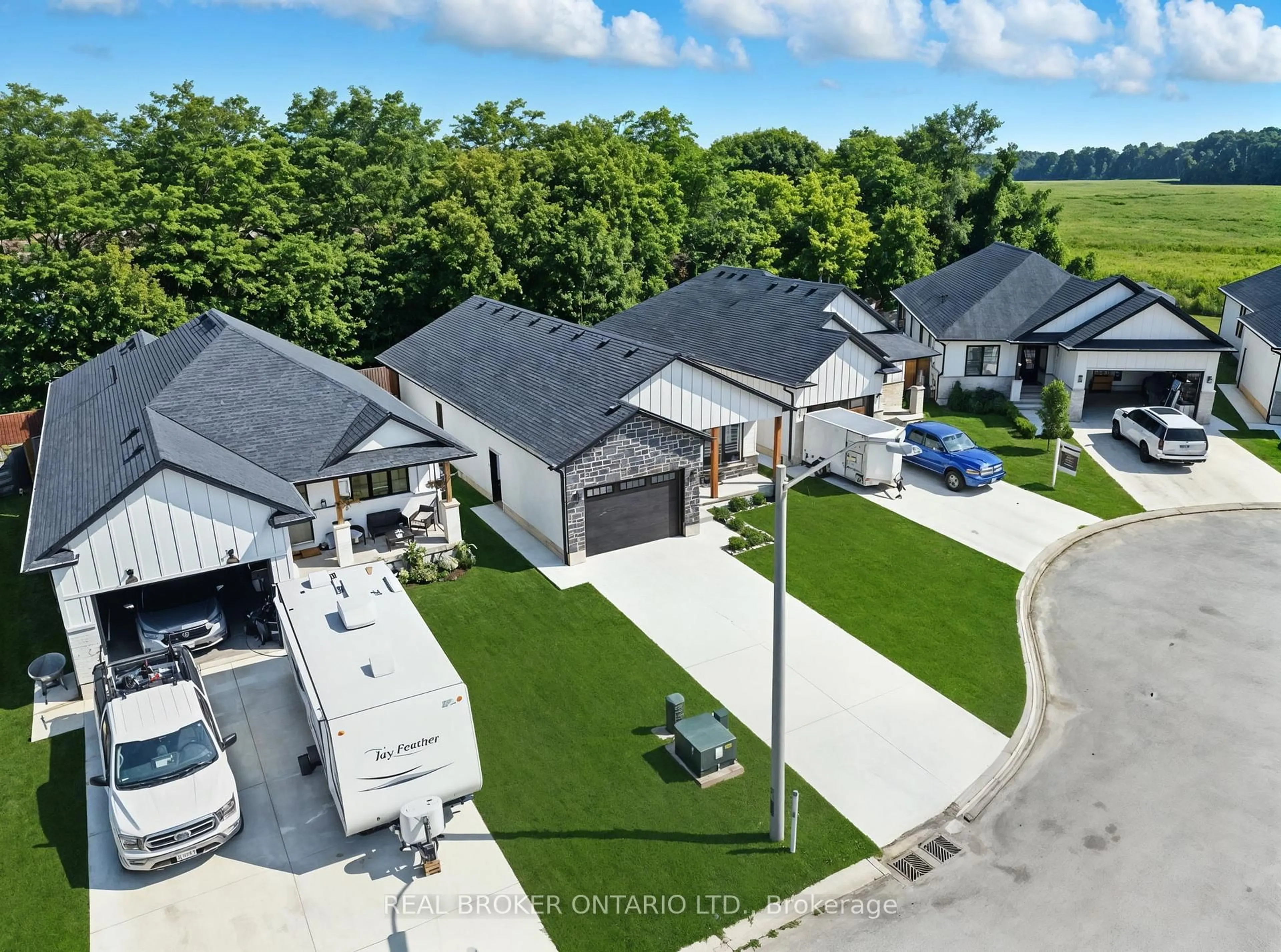 A pic from outside/outdoor area/front of a property/back of a property/a pic from drone, street for 7 Macneil Crt, Bayham Ontario N0J 1T0
