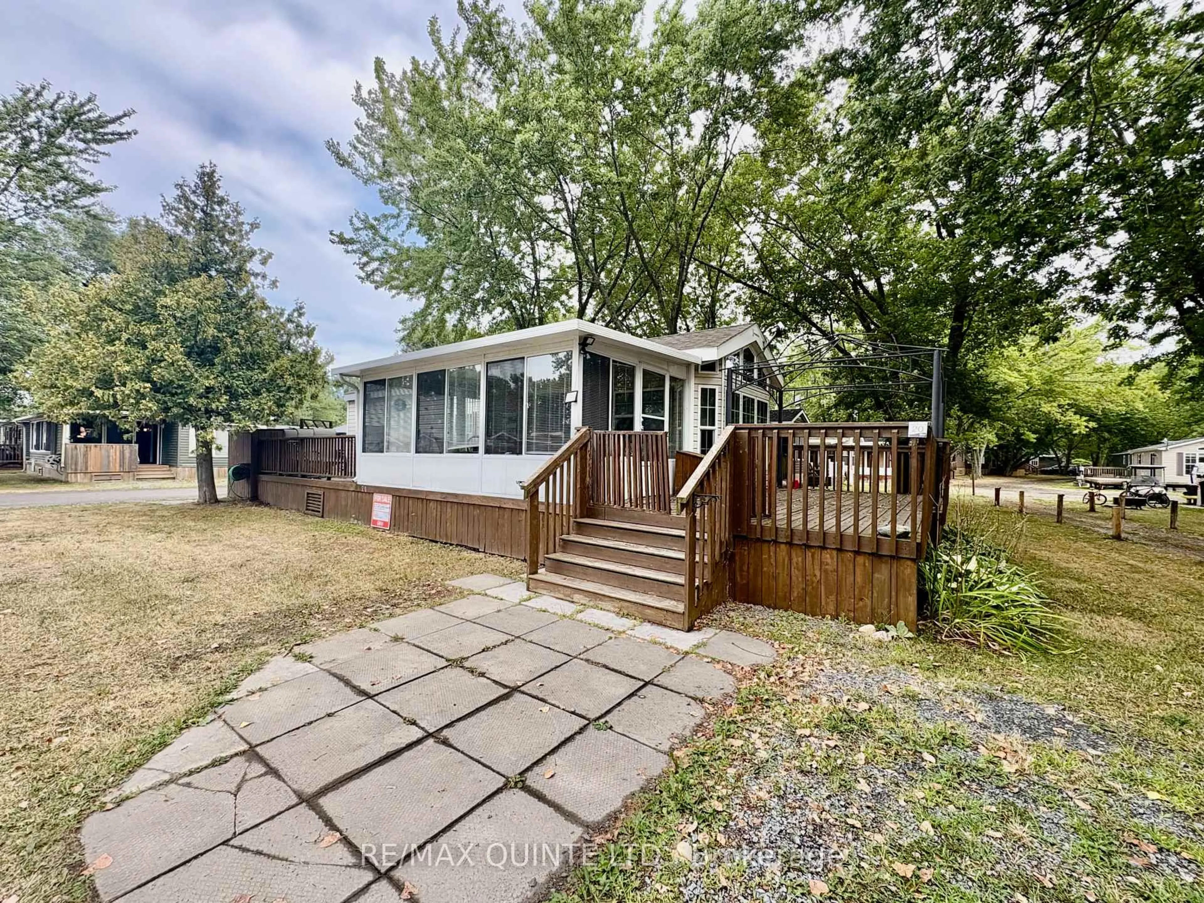 A pic from outside/outdoor area/front of a property/back of a property/a pic from drone, unknown for 486 County Rd 18 Rd #20 Cherry Beach Lane, Prince Edward County Ontario K0K 1P0