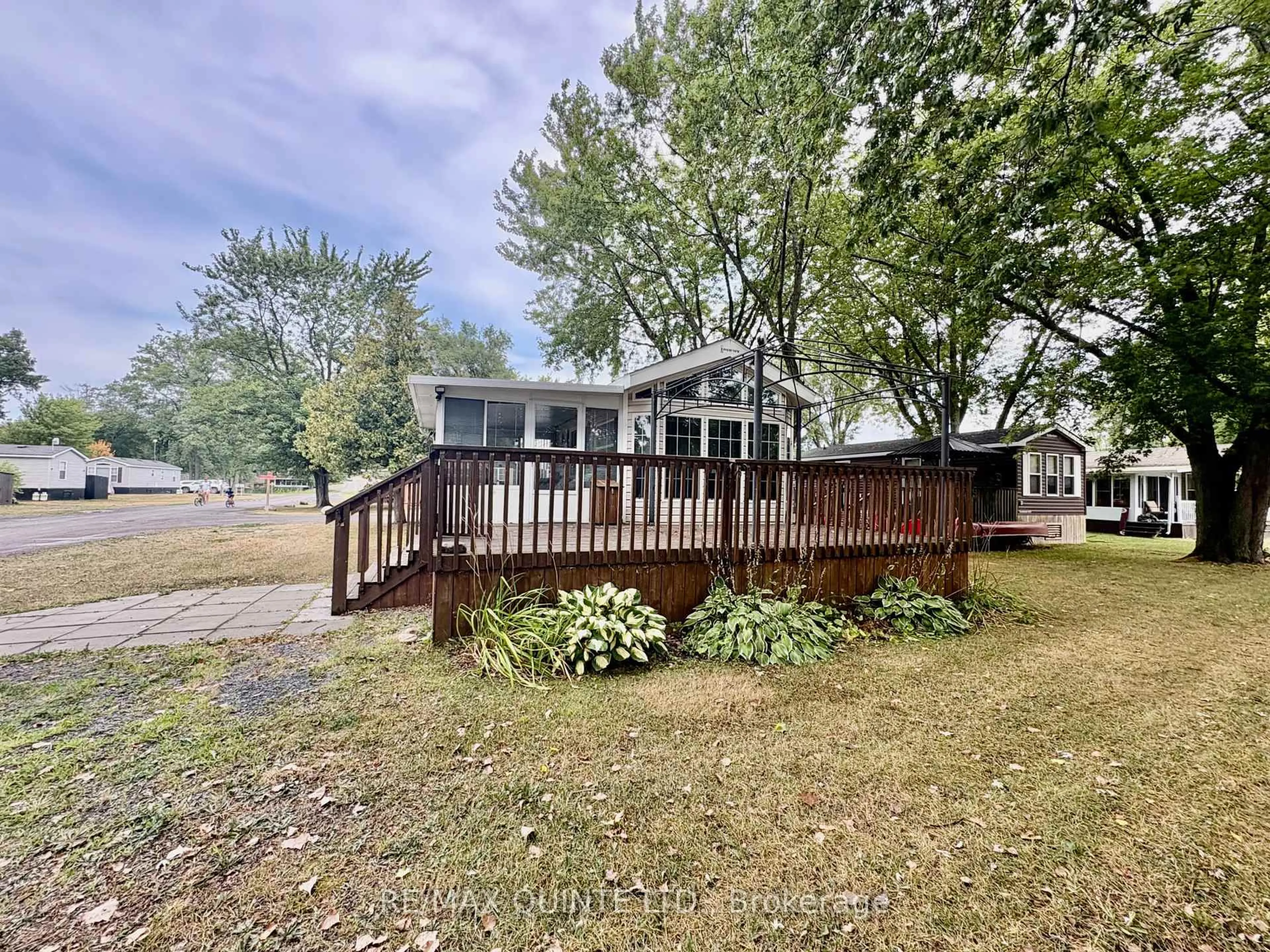 A pic from outside/outdoor area/front of a property/back of a property/a pic from drone, water/lake/river/ocean view for 486 County Rd 18 Rd #20 Cherry Beach Lane, Prince Edward County Ontario K0K 1P0