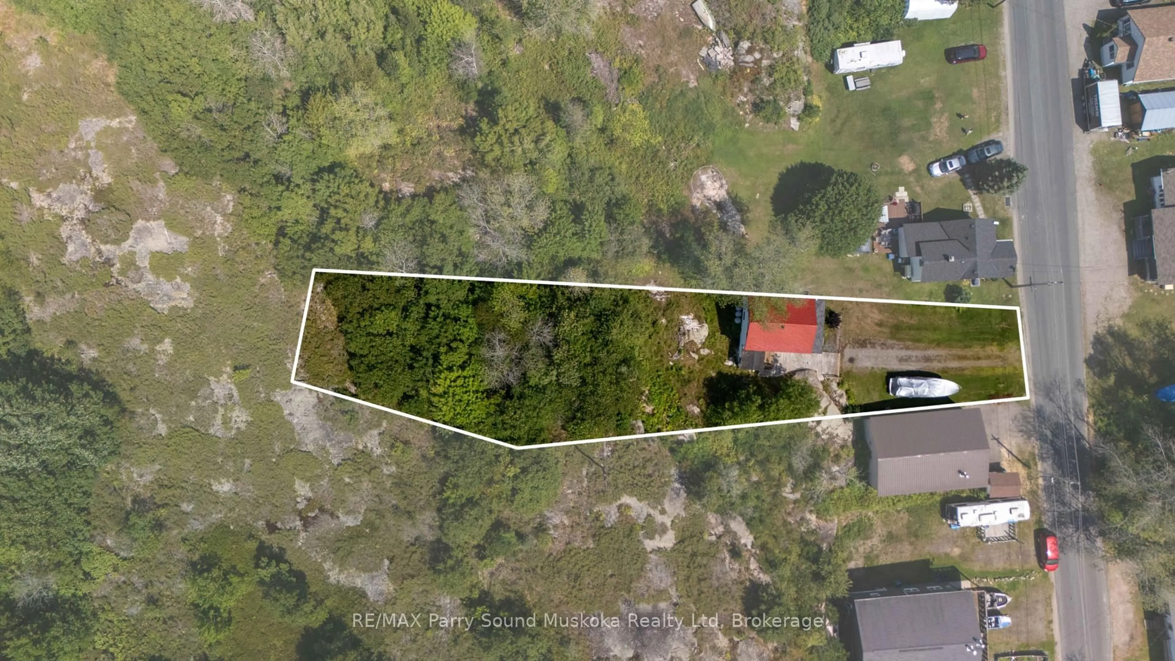A pic from outside/outdoor area/front of a property/back of a property/a pic from drone, building for 1027 Riverside Dr, Parry Sound Remote Area Ontario P0G 1A0