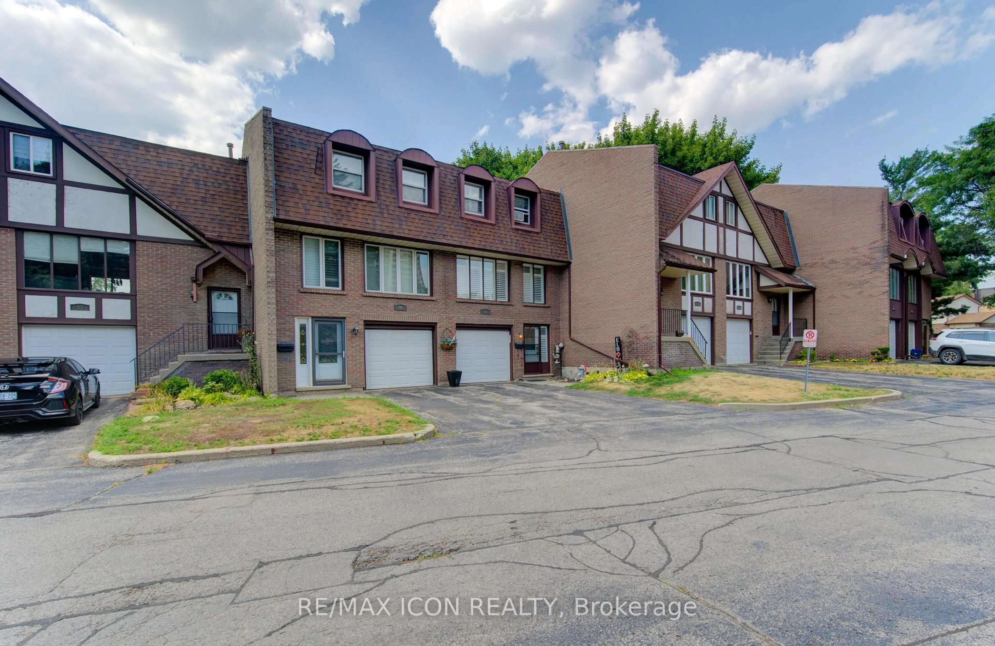 A pic from outside/outdoor area/front of a property/back of a property/a pic from drone, mountain view for 49 Cedarwoods Cres #57, Kitchener Ontario N2C 2L1