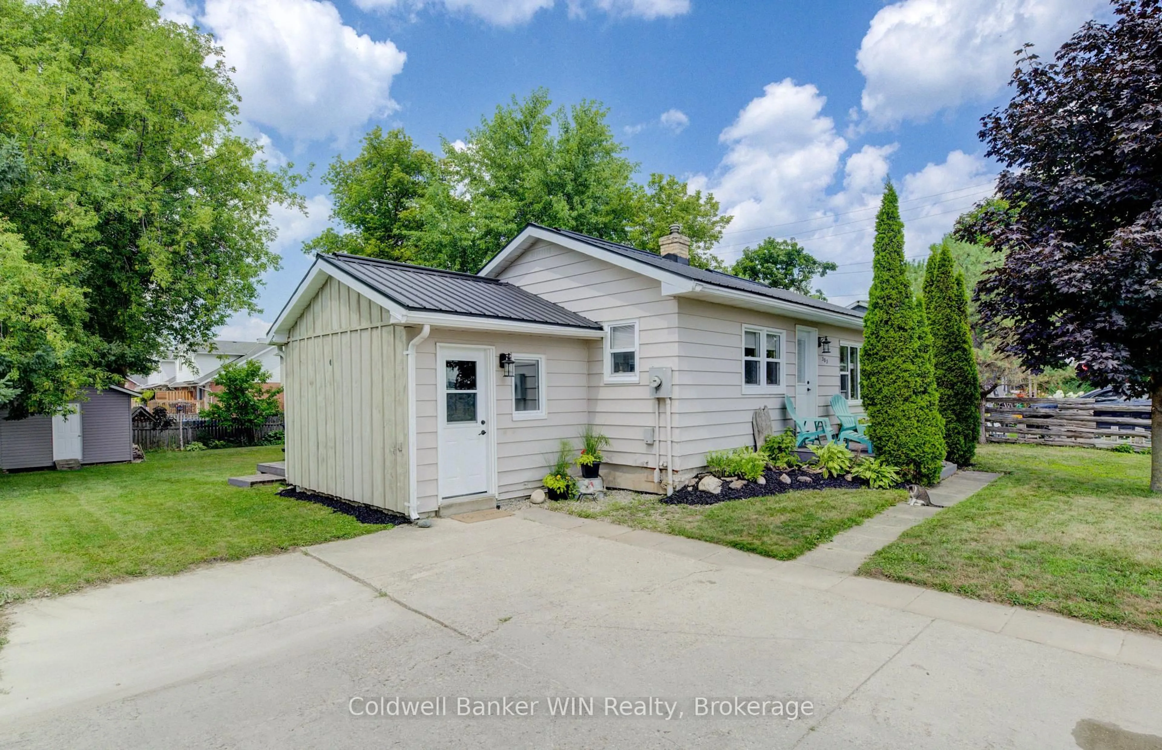 Home with vinyl exterior material, street for 383 Wellington St, Wellington North Ontario N0G 2L2
