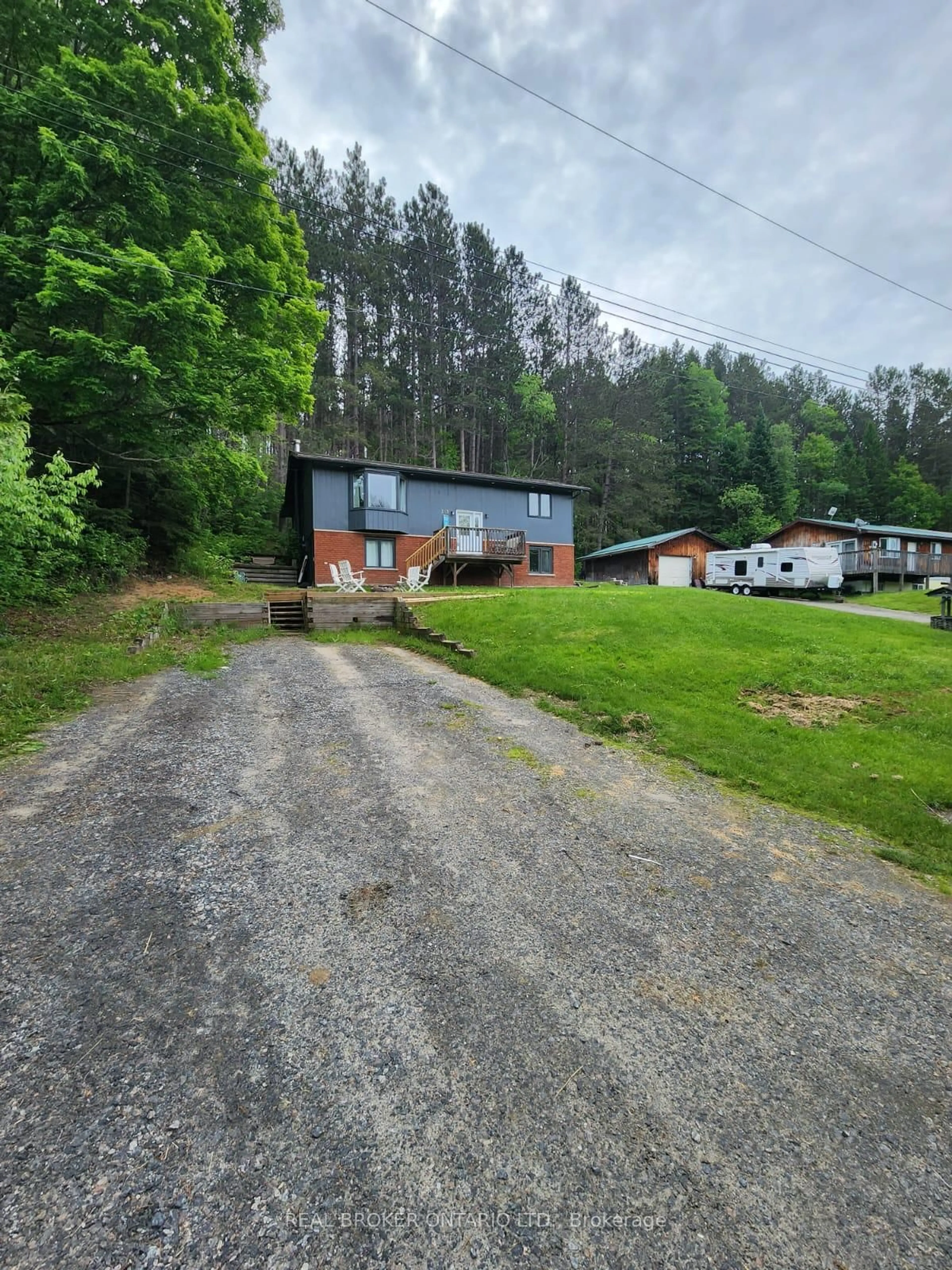 A pic from outside/outdoor area/front of a property/back of a property/a pic from drone, unknown for 313 Syples St, Armour Ontario P0A 1C0