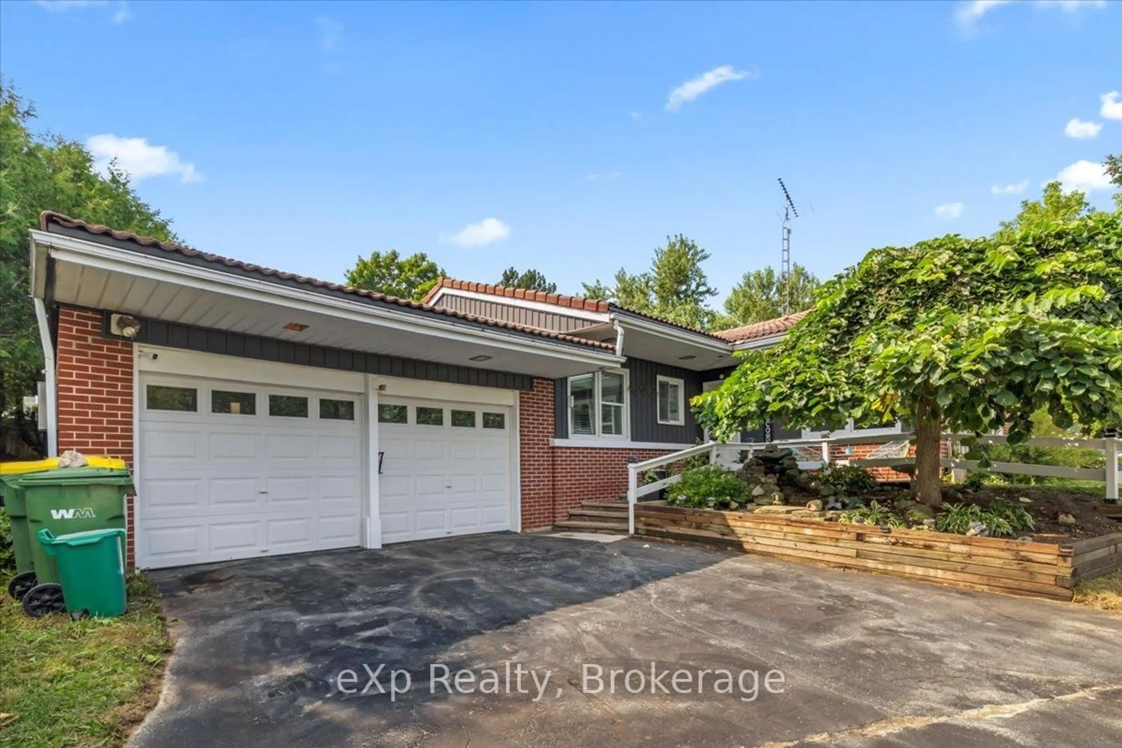 A pic from outside/outdoor area/front of a property/back of a property/a pic from drone, street for 151 River Rd, Grey Highlands Ontario N0C 1C0