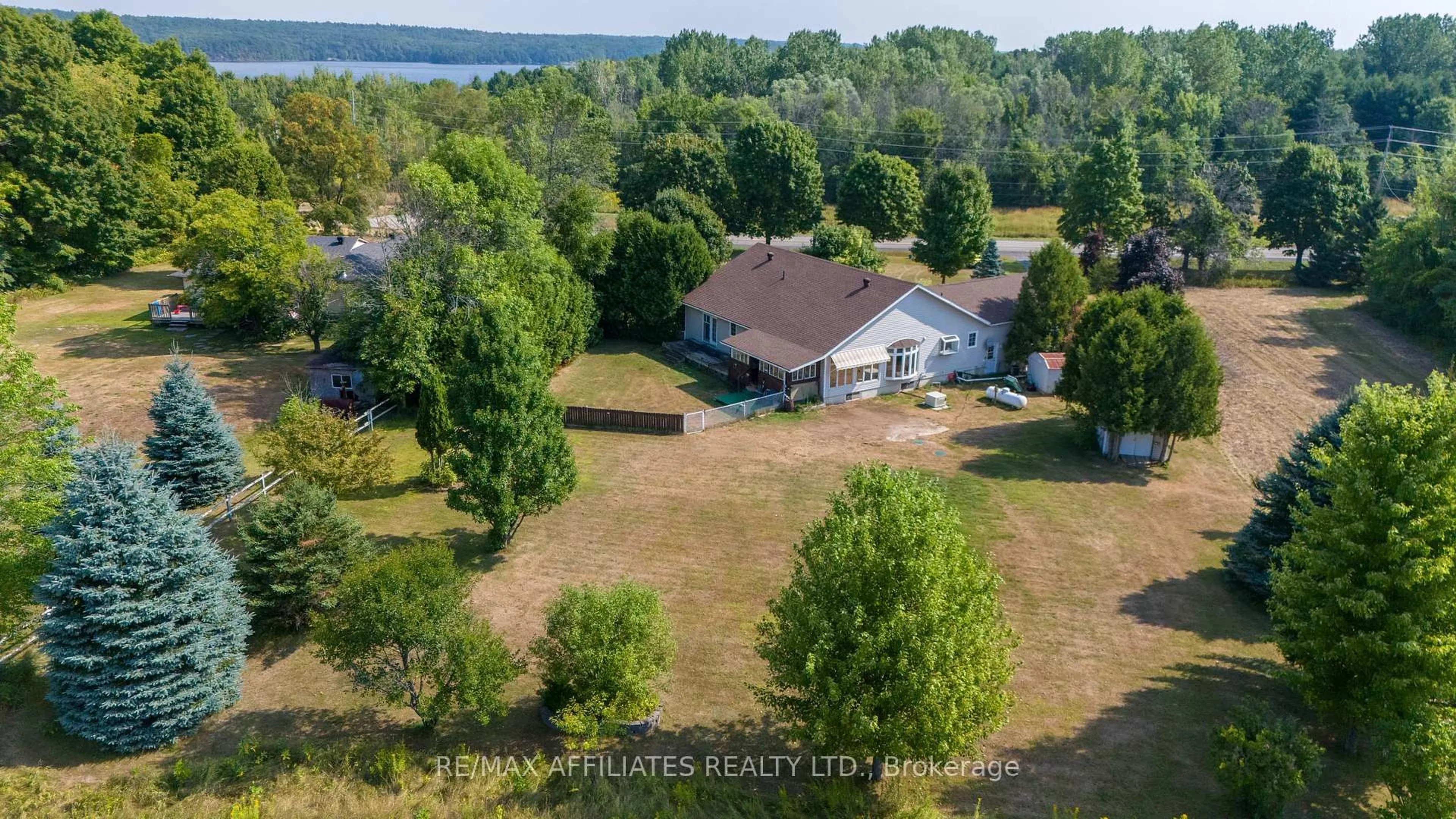 A pic from outside/outdoor area/front of a property/back of a property/a pic from drone, water/lake/river/ocean view for 9727 Highway 42 Highway, Rideau Lakes Ontario K0G 1X0