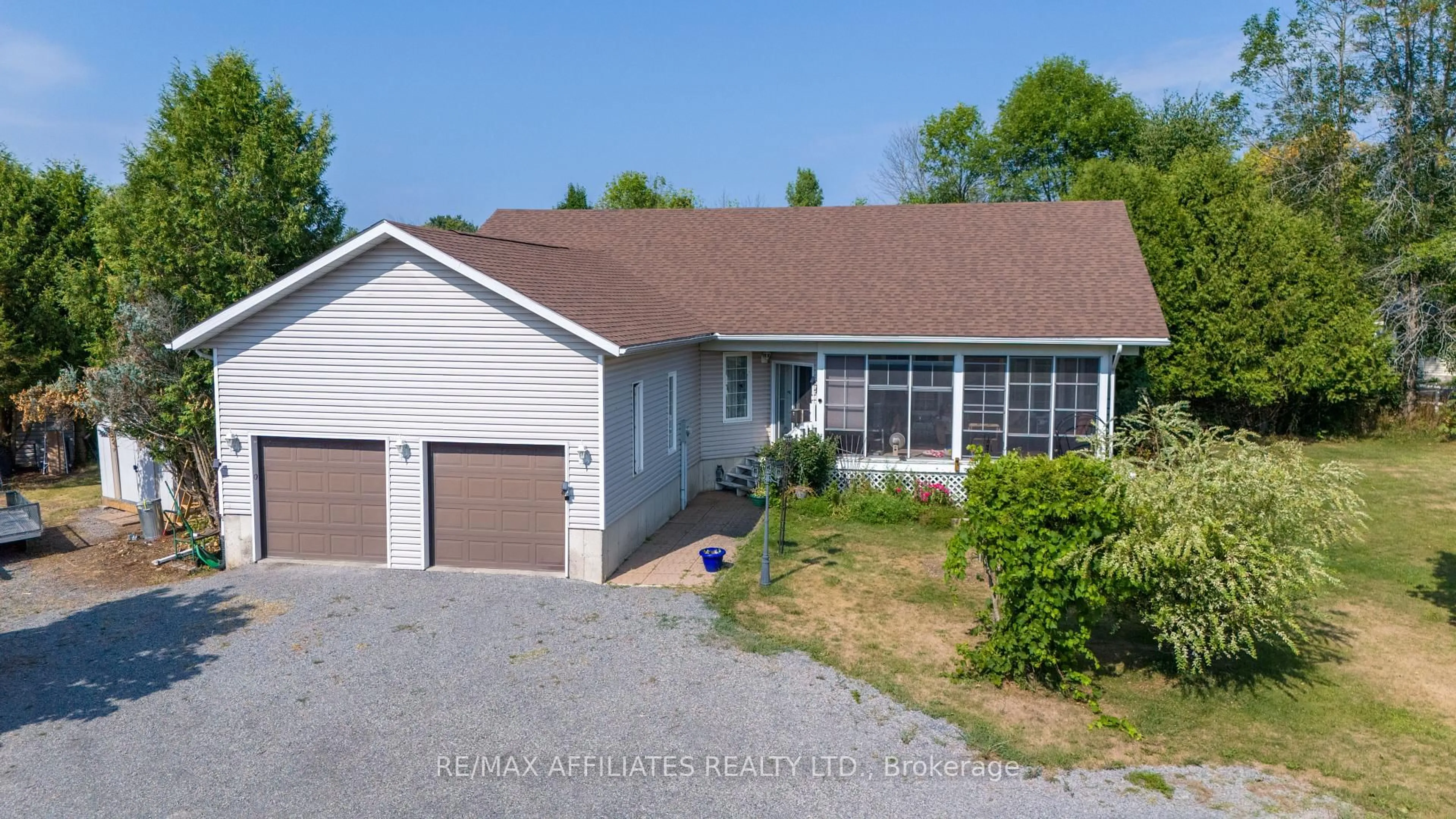 A pic from outside/outdoor area/front of a property/back of a property/a pic from drone, street for 9727 Highway 42 Highway, Rideau Lakes Ontario K0G 1X0