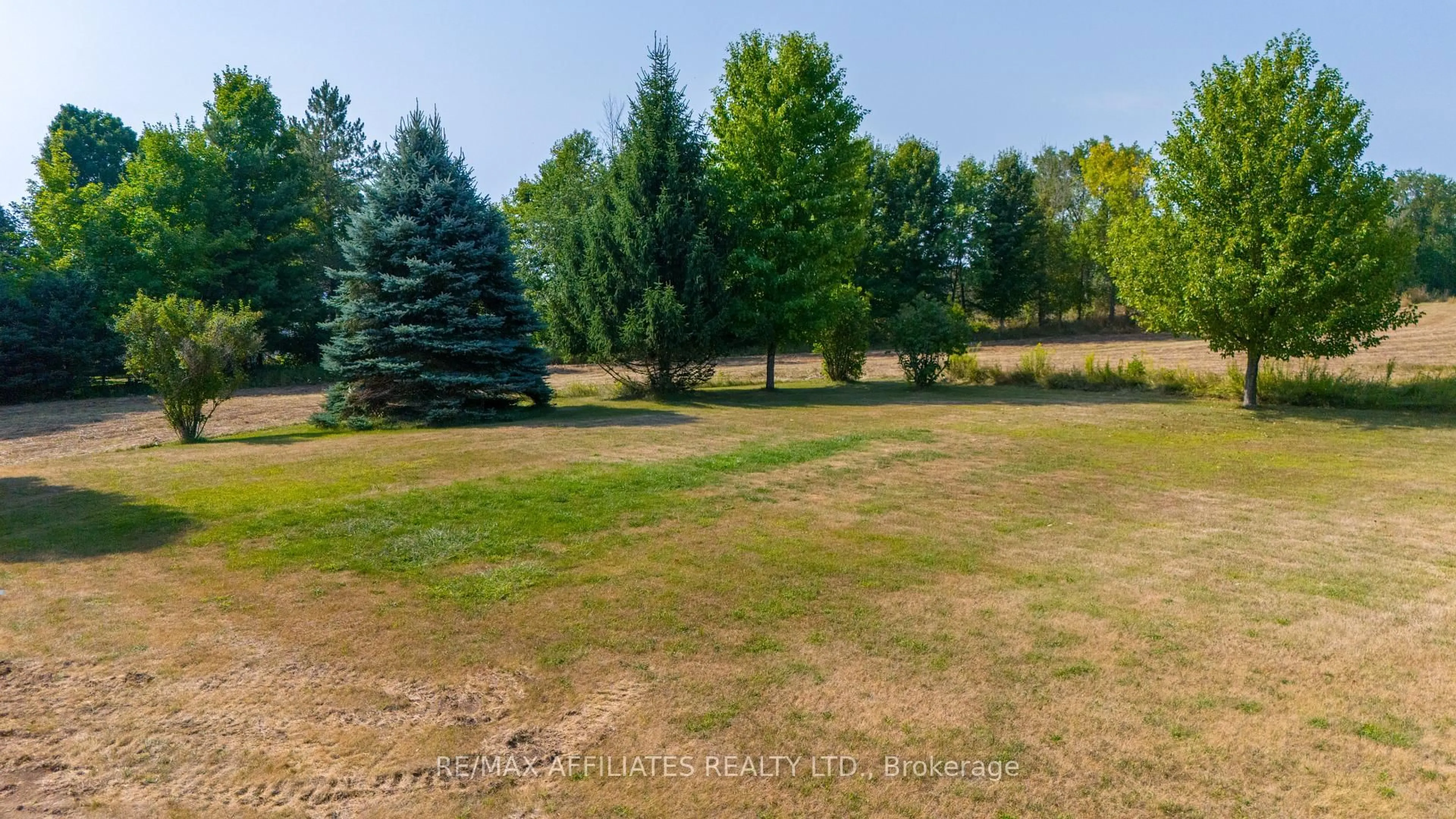 A pic from outside/outdoor area/front of a property/back of a property/a pic from drone, forest/trees view for 9727 Highway 42 Highway, Rideau Lakes Ontario K0G 1X0