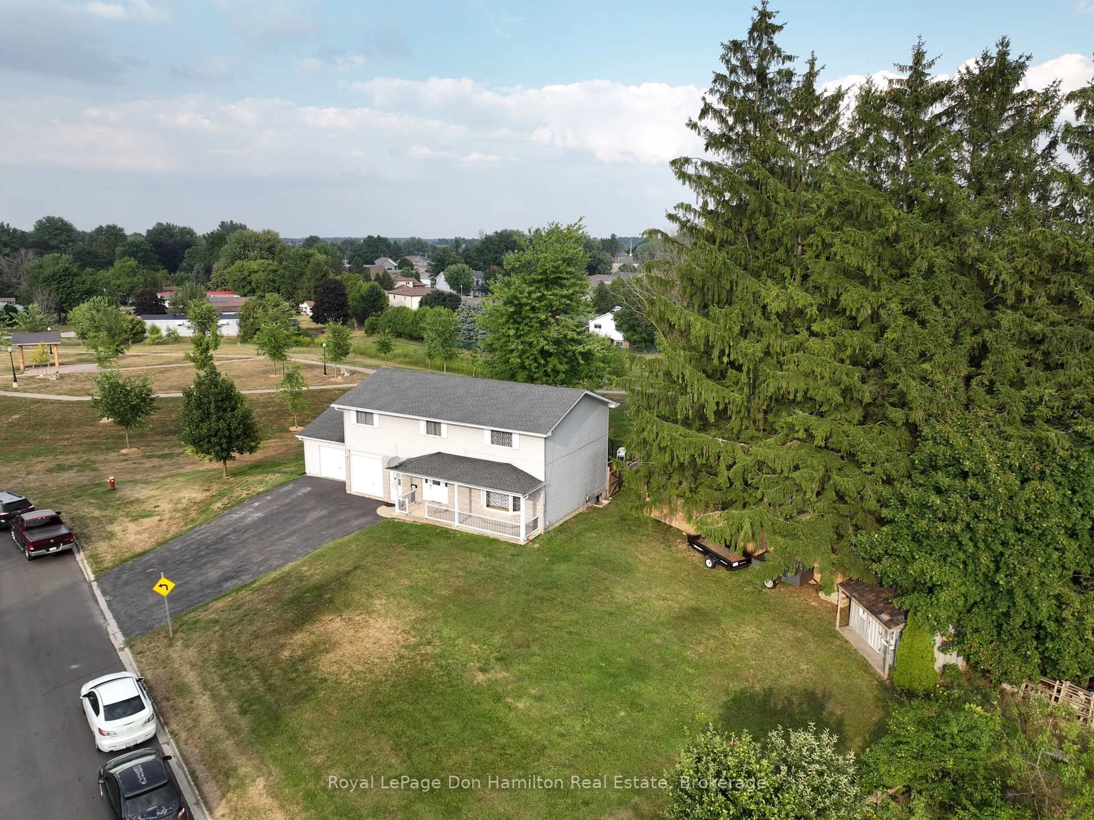 A pic from outside/outdoor area/front of a property/back of a property/a pic from drone, unknown for 100 Arthur St, Minto Ontario N0G 2P0