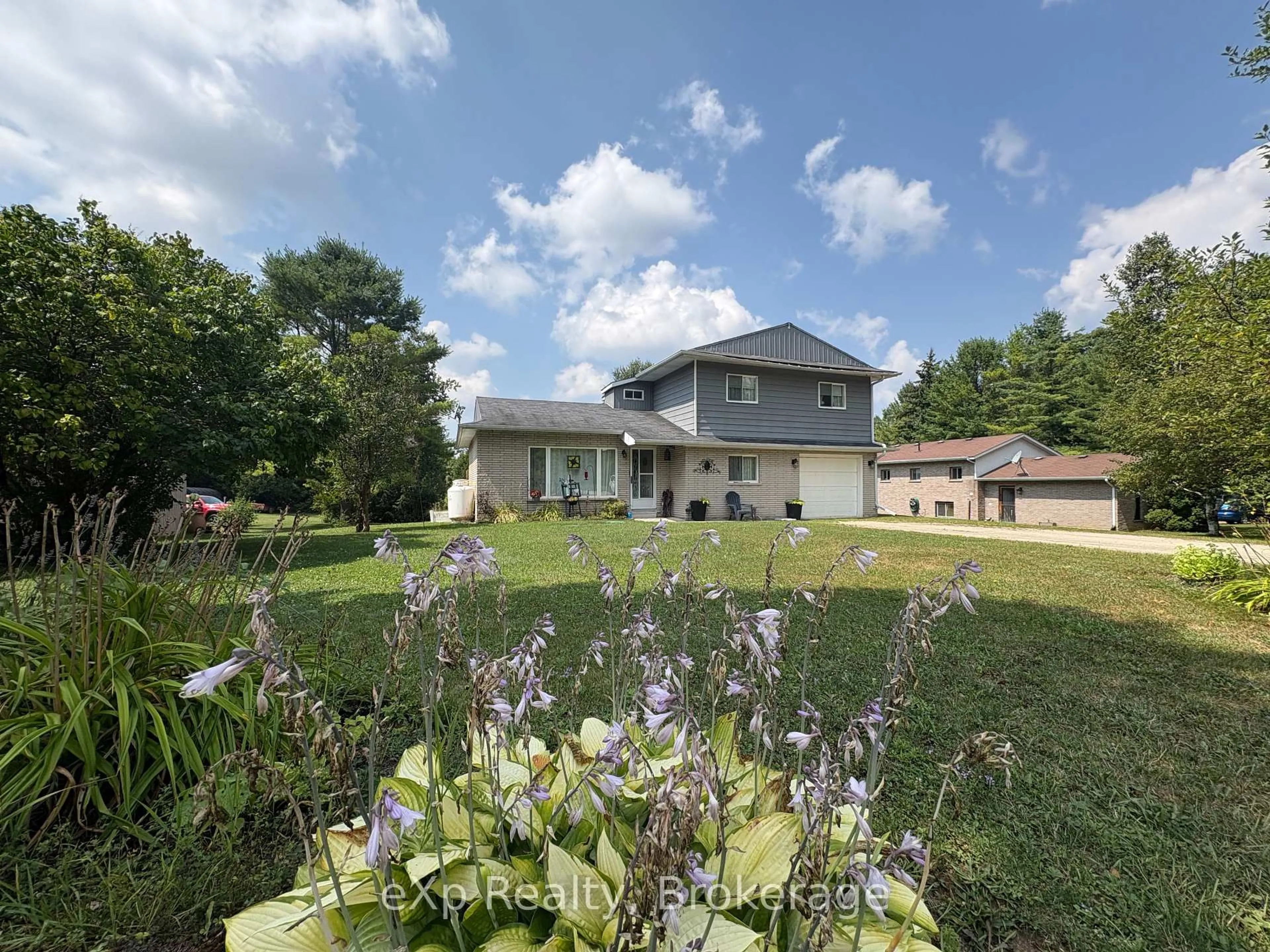 A pic from outside/outdoor area/front of a property/back of a property/a pic from drone, unknown for 174340 Mulock Rd, West Grey Ontario N0G 1S0